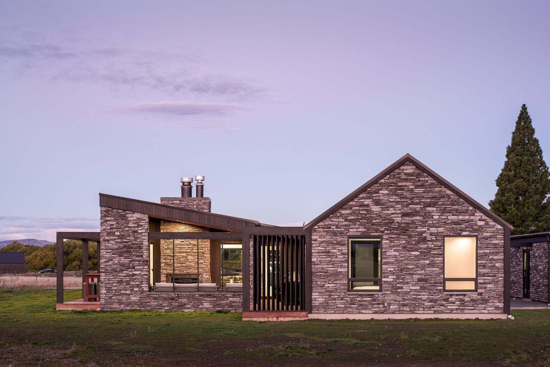 The western elevation shows off the mix between traditional gable form and more contemporary monopitch roofline.