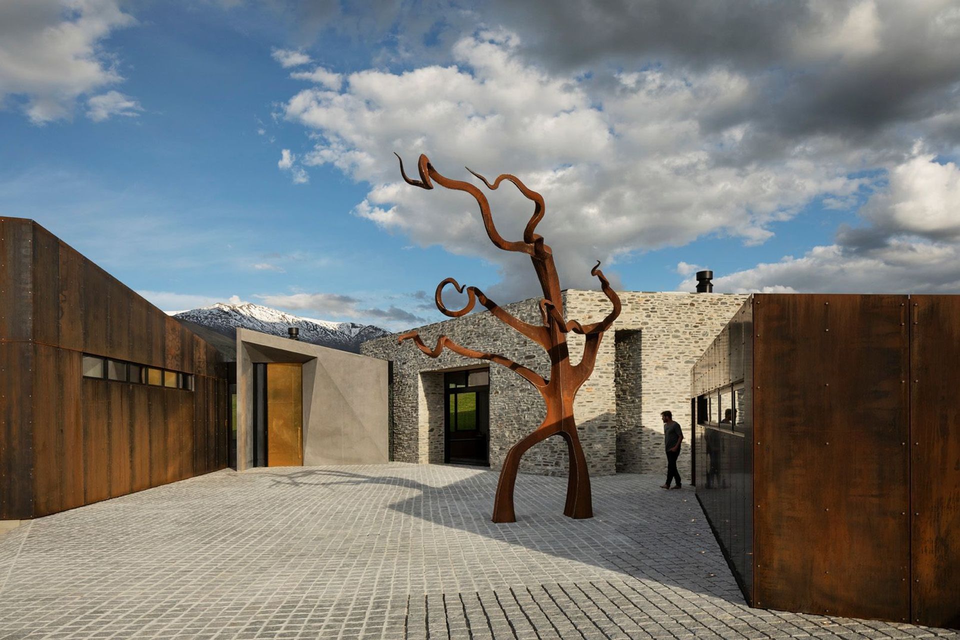 A collection of buildings in stone, steel and concrete reference the vernacular forms and materials seen throughout Central Otago – in rusty rural sheds and miners' shacks