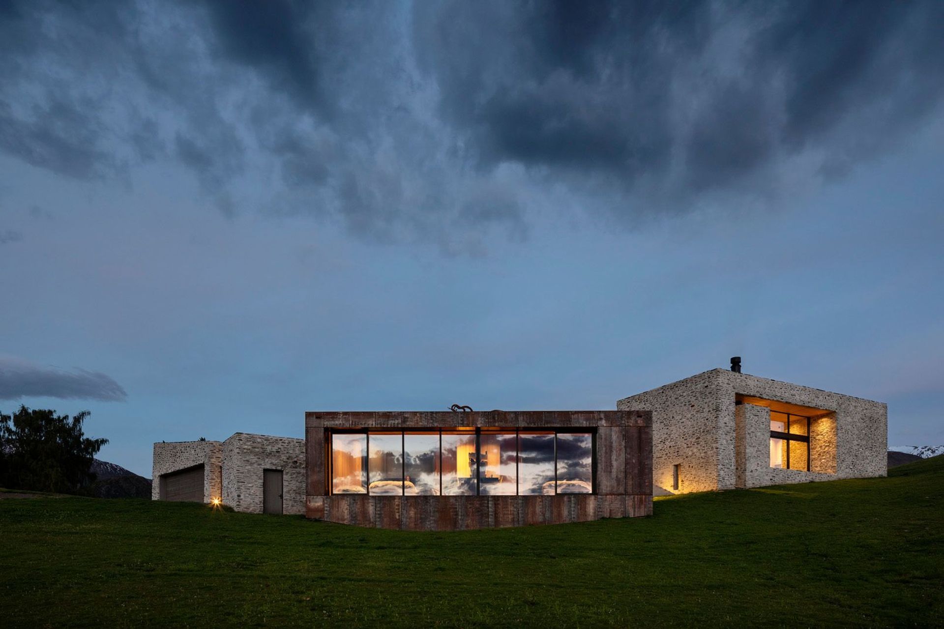 Each building funnels a view of a nearby mountain.