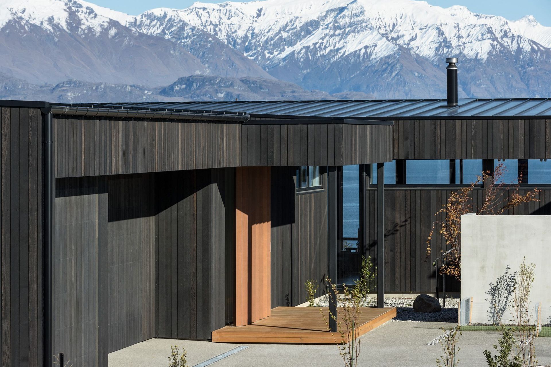 A restrained street elevation with high glazing for morning sun conceals a detailed interior and gives privacy to the family.   