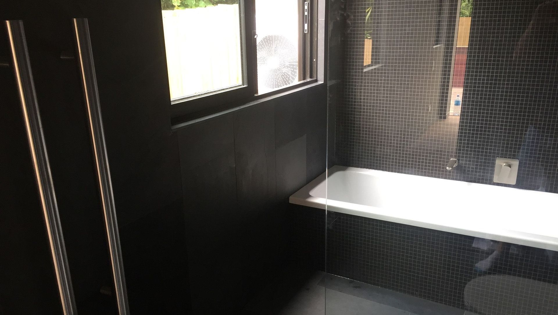 Black Tiled Bathroom banner