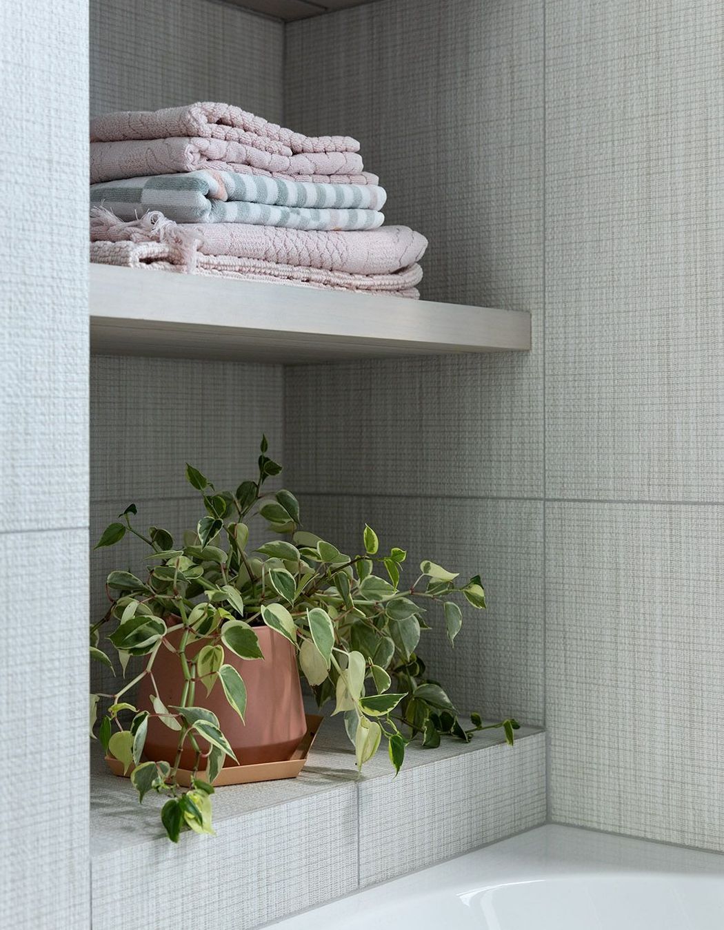 Built-in shelving in the bathroom.