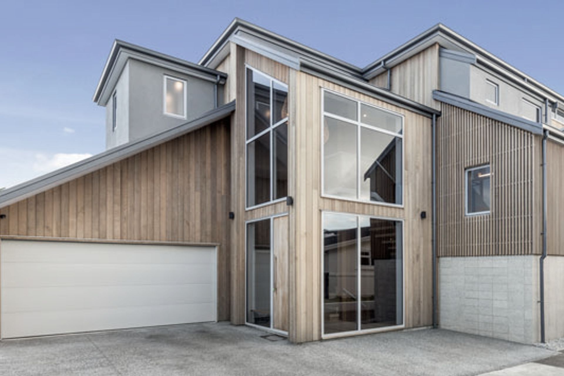 Clad in Cedar timber this Mount Maunganui home sits well in the coastal environment with wonderful water views as the backdrop.