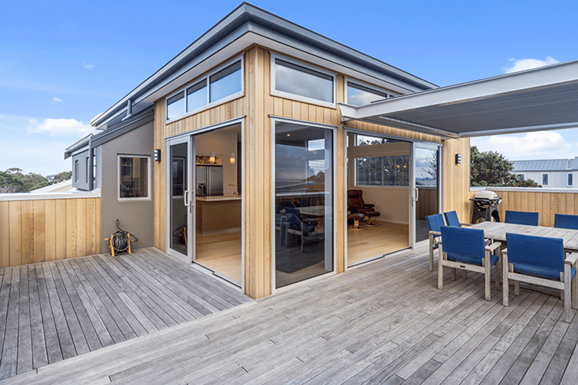 Outdoor living and dining flows easily inside and out.