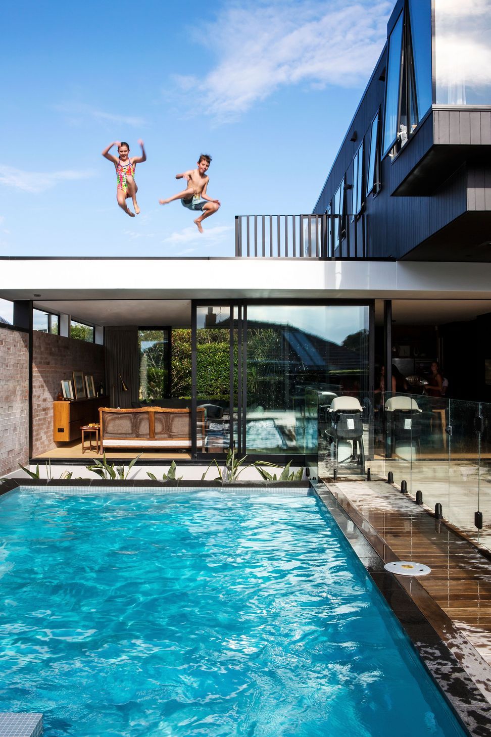 Inspired by the iconic Stahl House* in California, where the kids can jump straight off the roof into the pool.