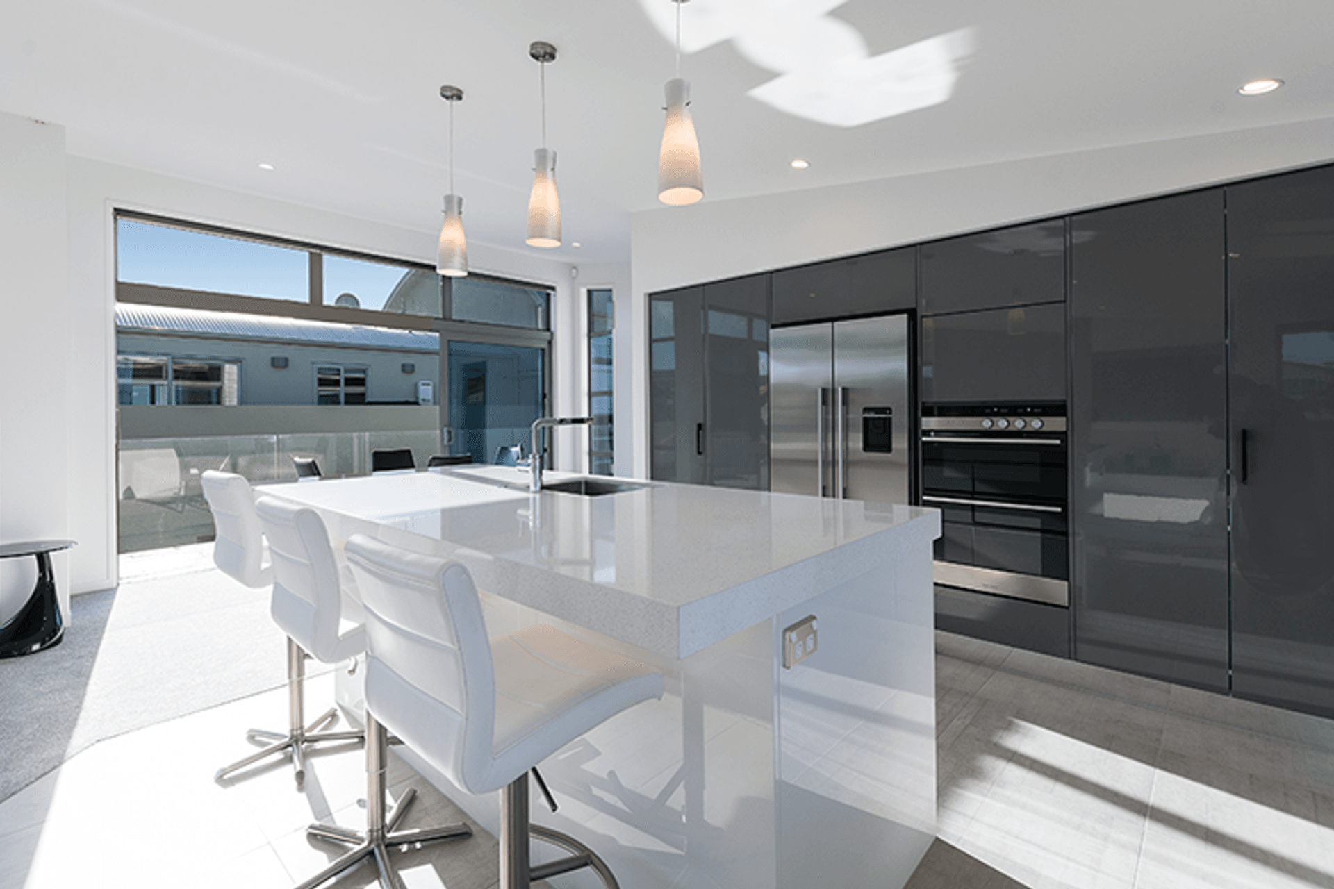 White stone and grey are the perfect combination throughout this contemporary home. 