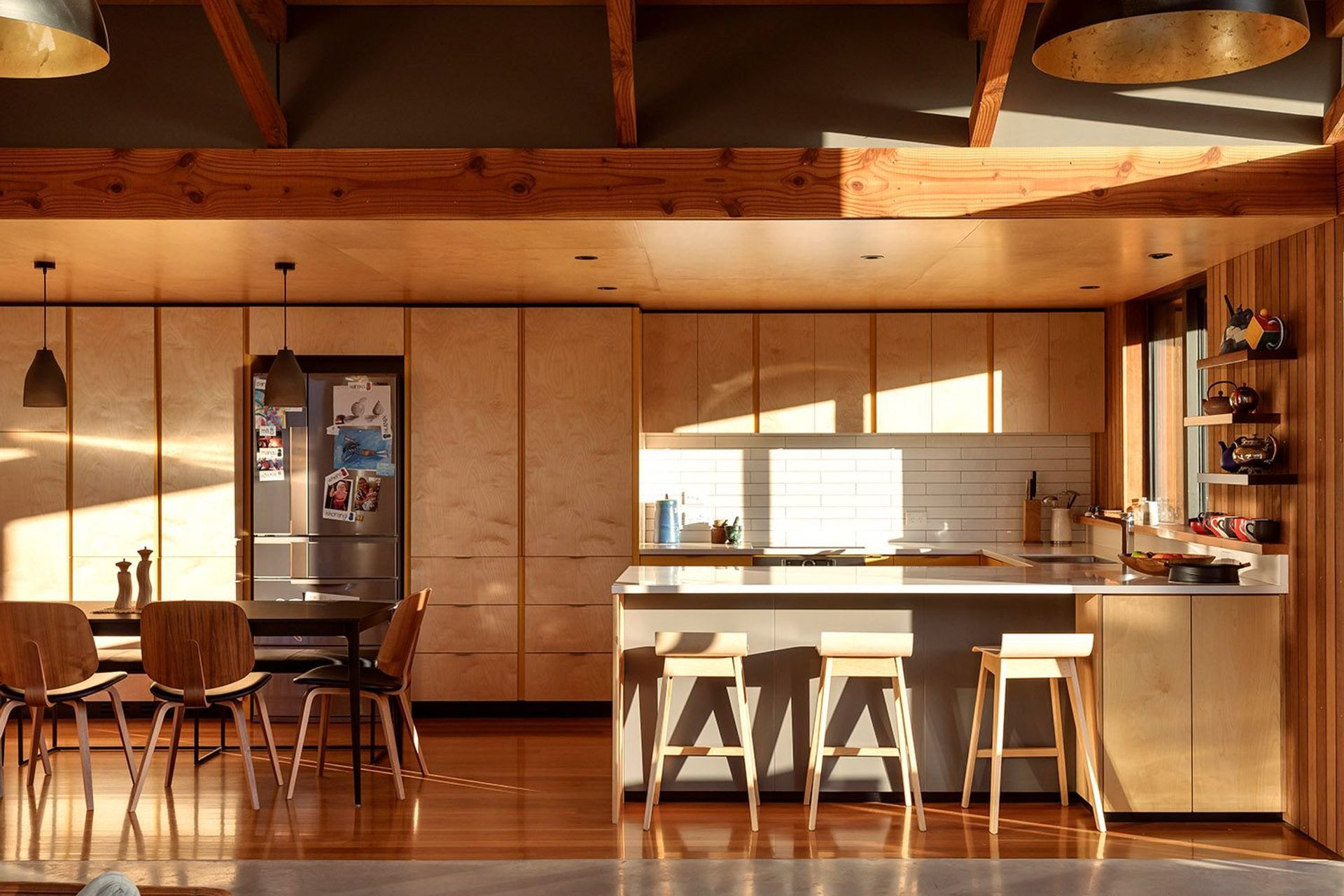 The clients’ love of timber and passion for woodcrafts led to a focus on the use of the material throughout the kitchen, central corridor and kitchen and living areas