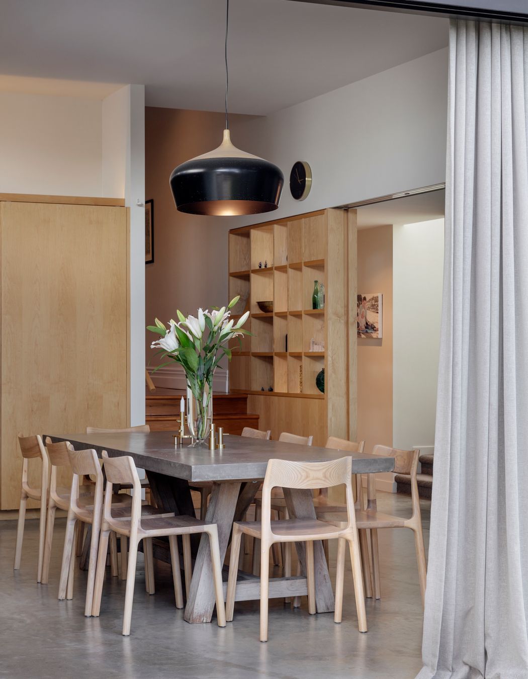 Large sliding doors open up the dining area to the garden.