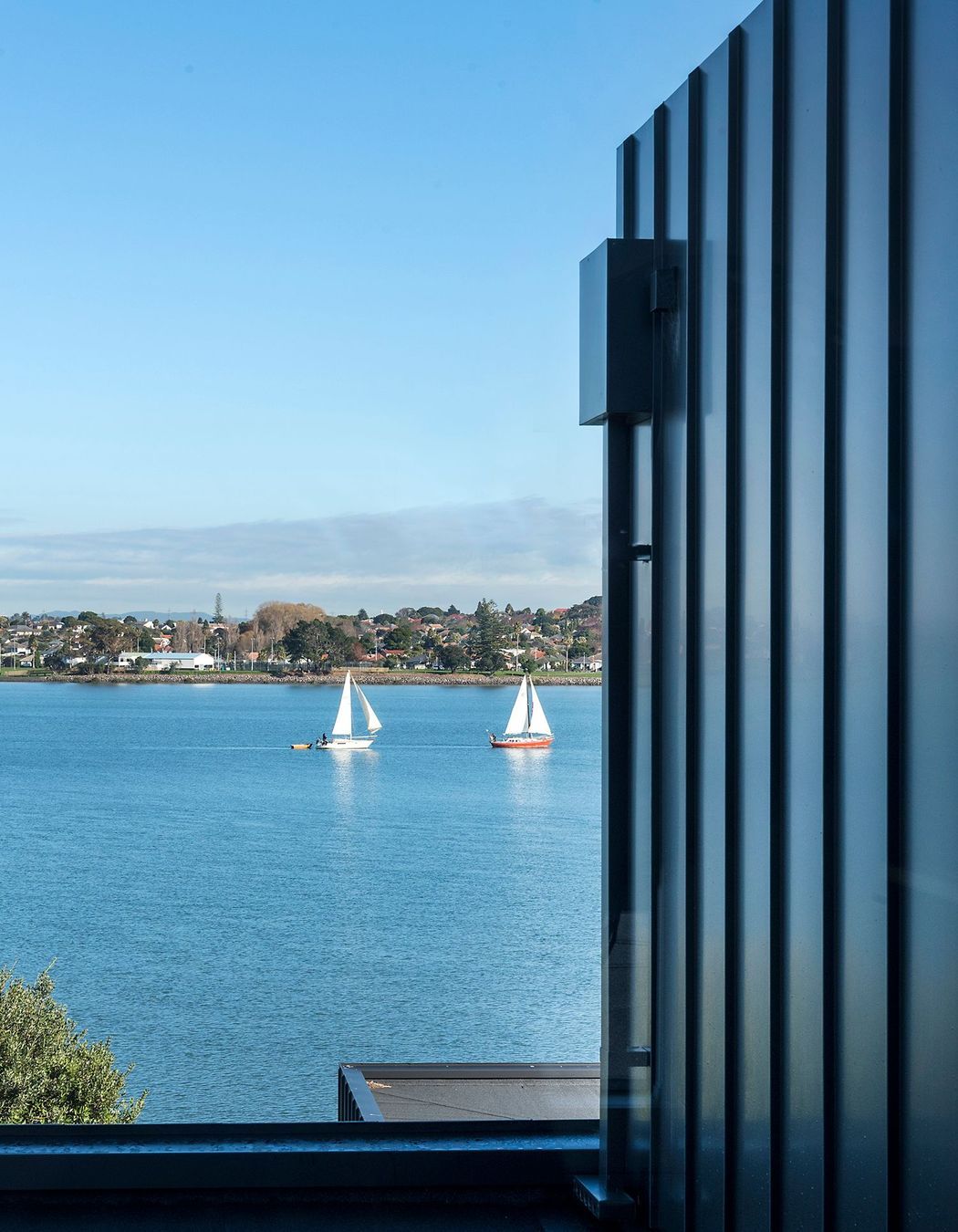 Watching the water and boats float by helps make this a remarkably peaceful home.