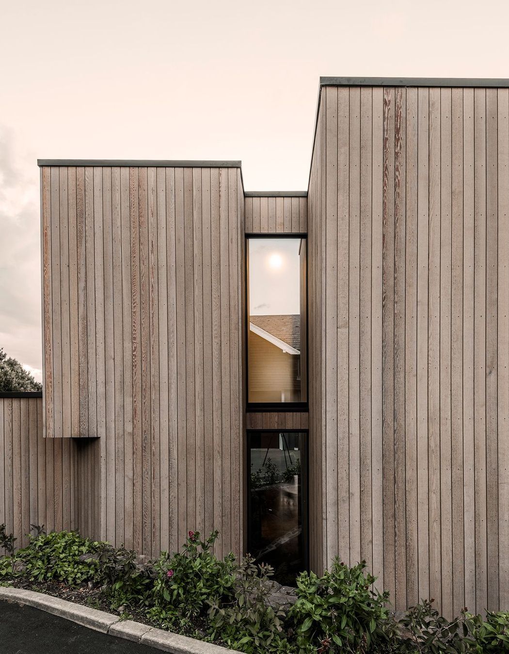 Tall windows and skylight draw plenty of natural light into the home.