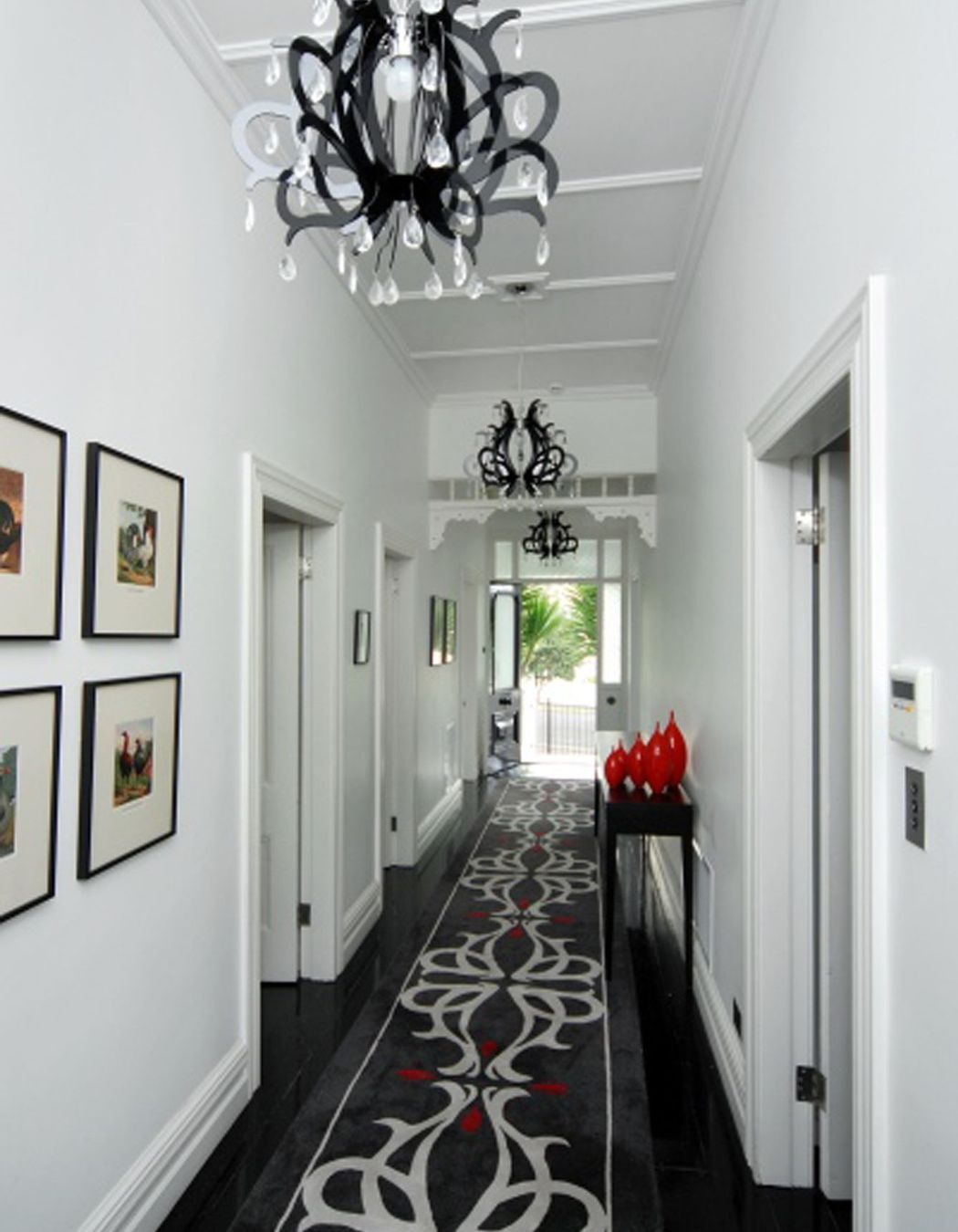 A custom designed floor run to connect with the contempory chandelier pendant lights.