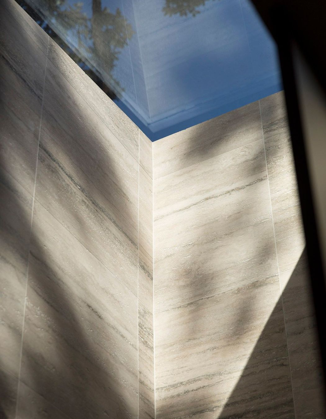 Looking up to the sky through the lightwell.