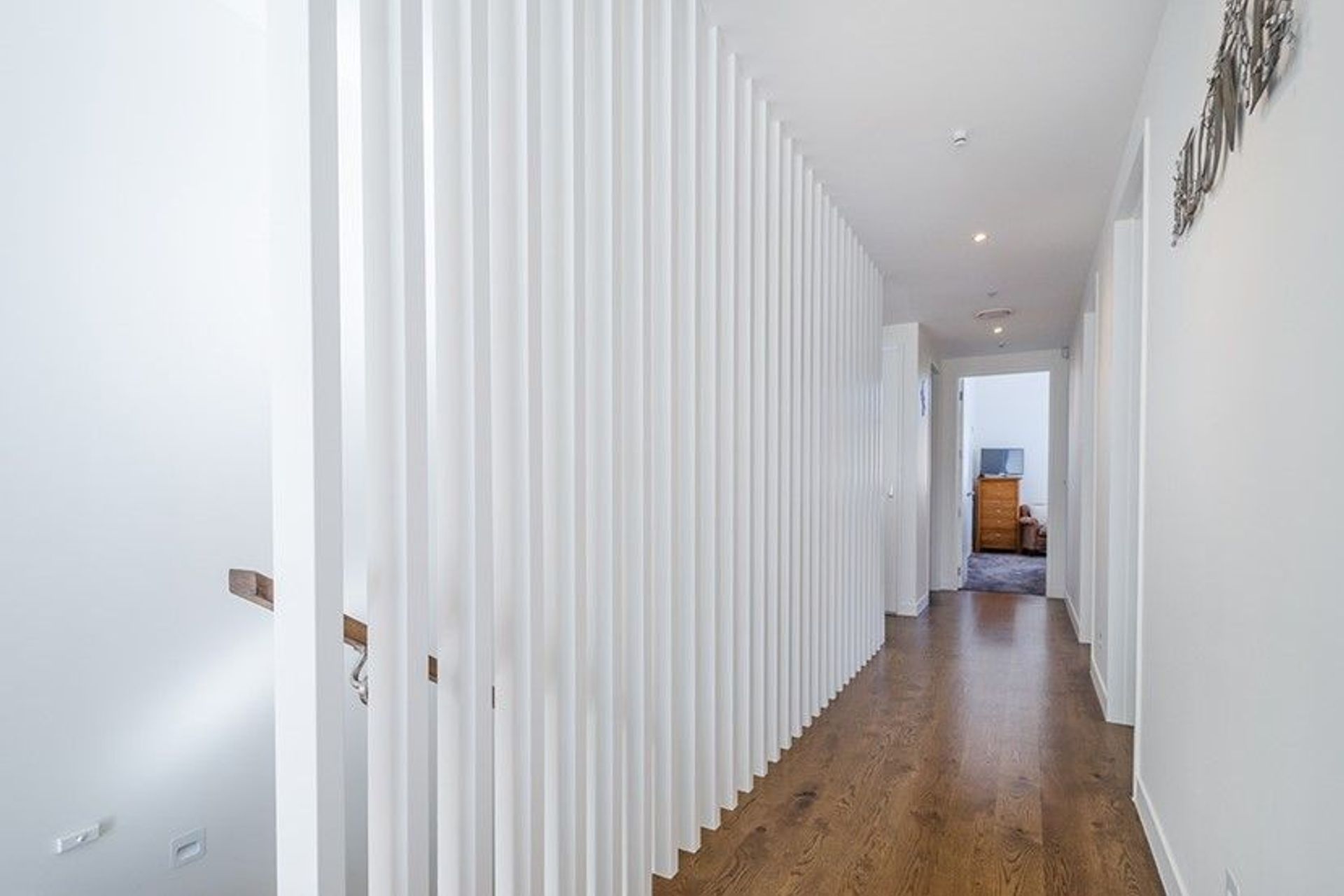 Hobsonville House I - Solid American White Oak Flooring finished w/ Stain in 'Antique Brown' and waterborne polyurethane