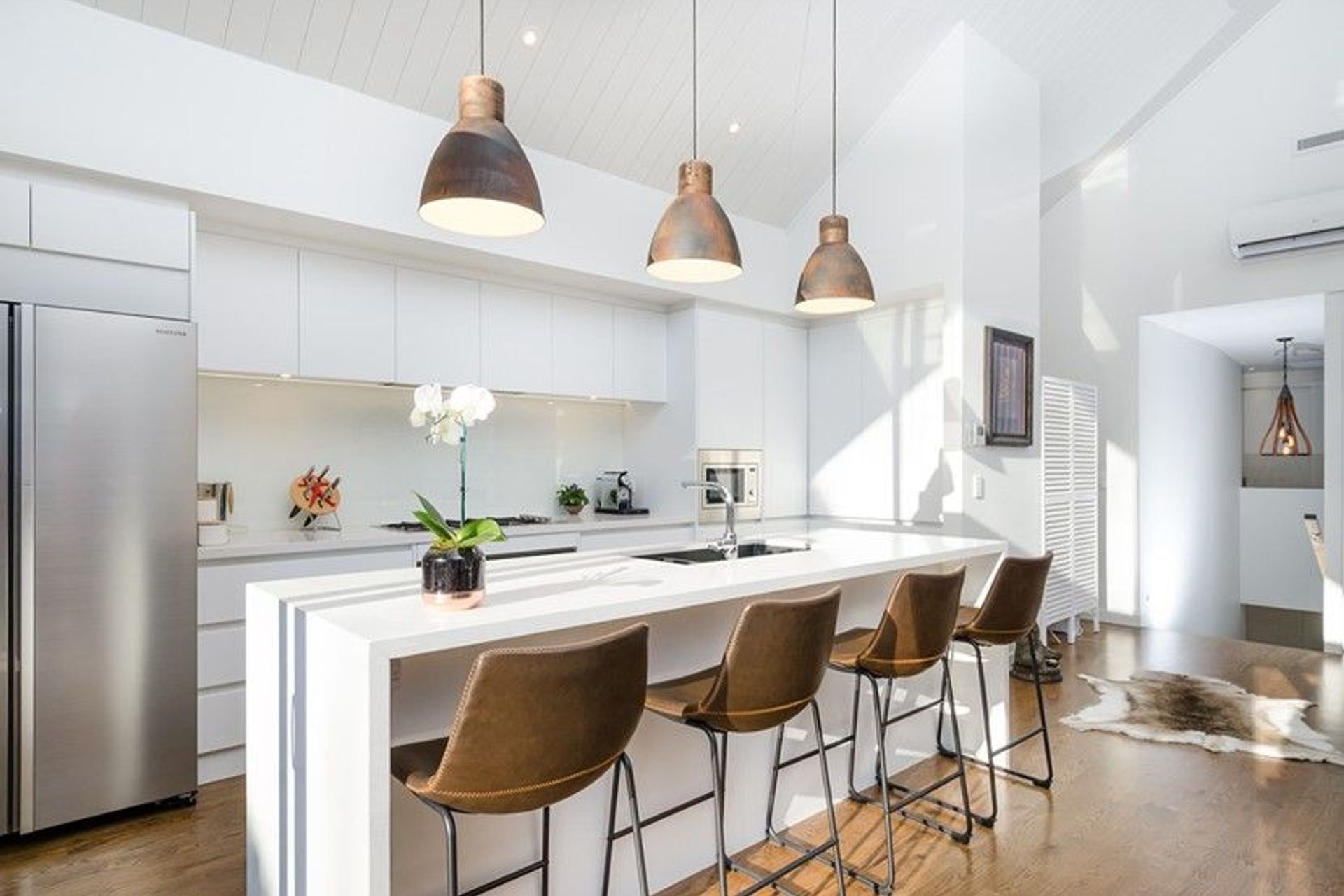 Hobsonville House I - Solid American White Oak Flooring finished w/ Stain in 'Antique Brown' and waterborne polyurethane