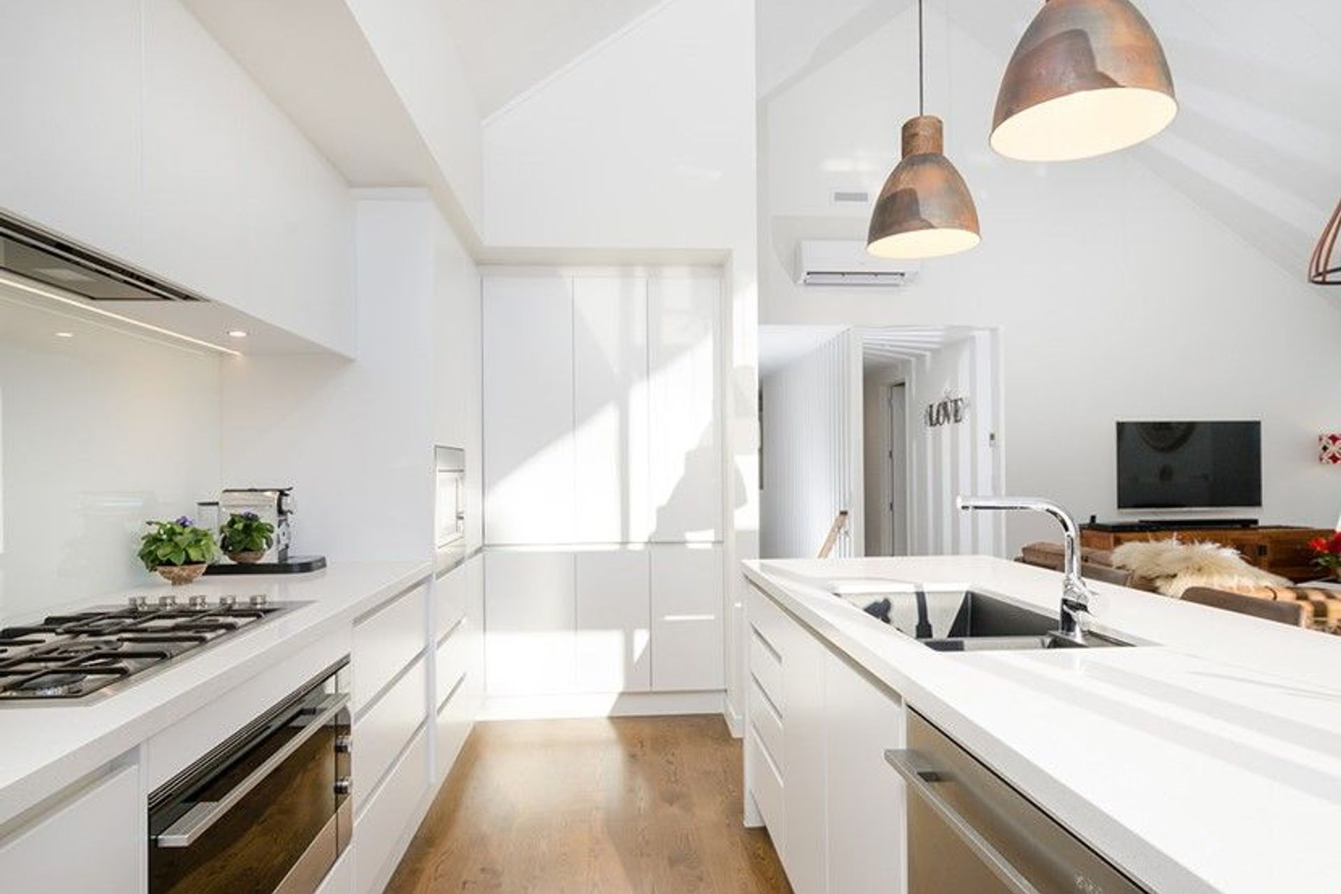Hobsonville House I - Solid American White Oak Flooring finished w/ Stain in 'Antique Brown' and waterborne polyurethane