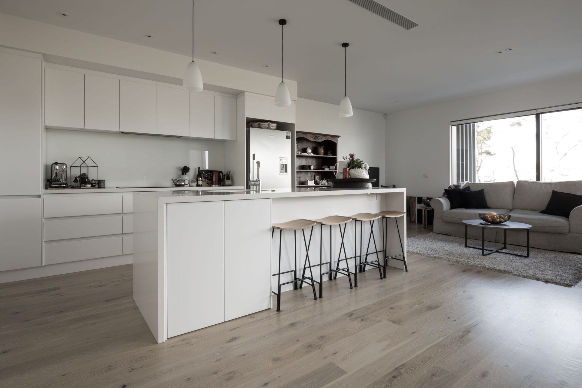 Hobsonville IV - Rustic Grade Solid American White Oak Flooring finished w/ Clear Waterborne Polyurethane.