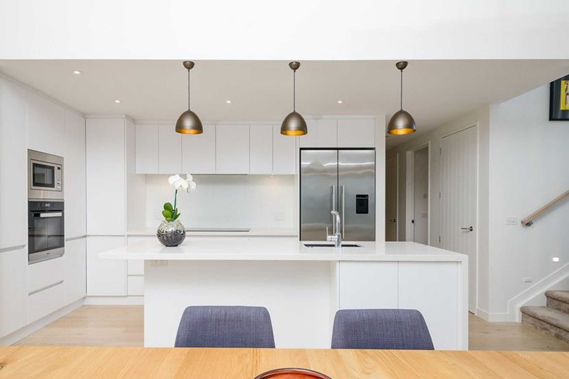 Hobsonville Pt Home - Solid American White Oak flooring finished w/ Bona Stain in 'White' + Waterborne Polyurethane