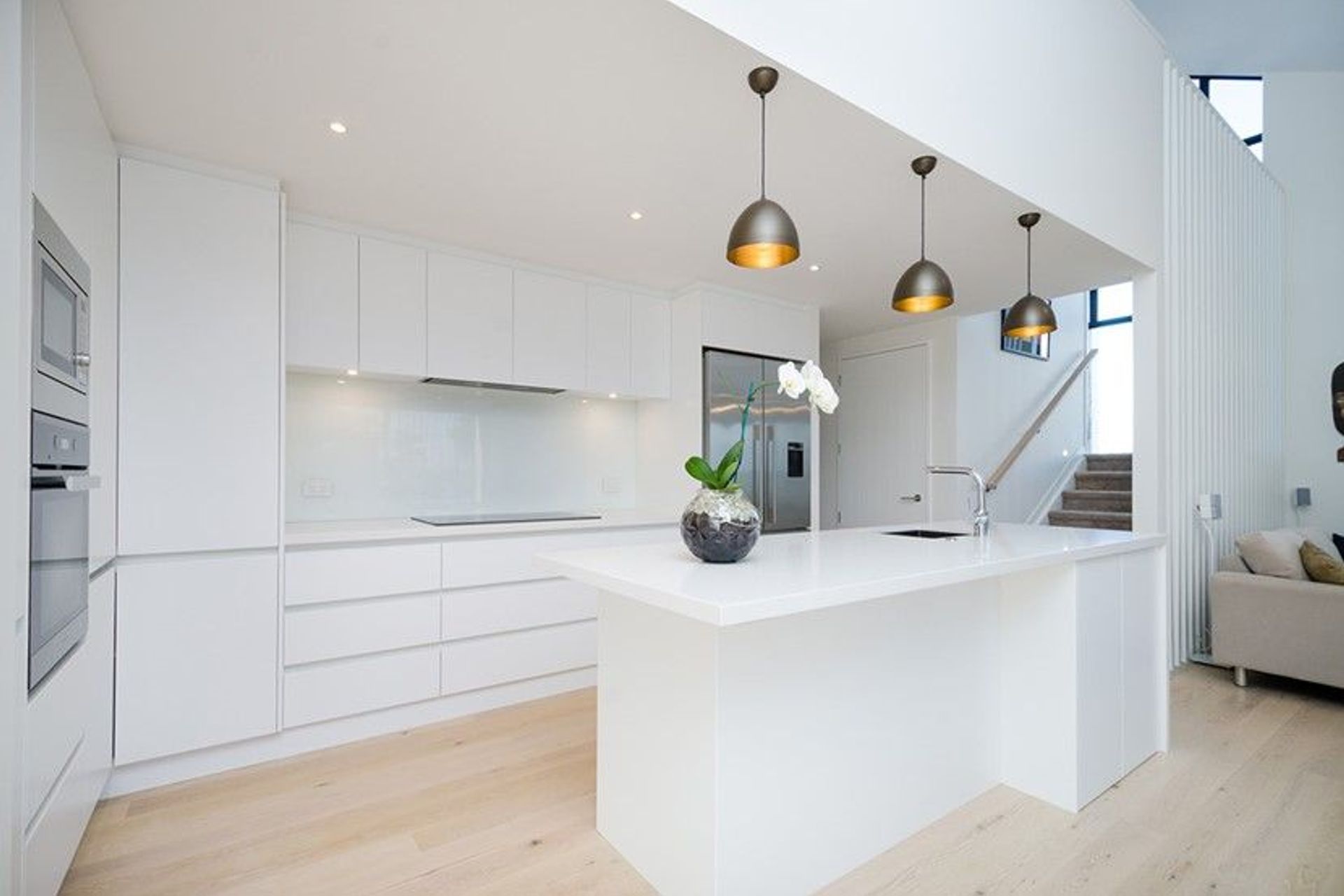 Hobsonville Pt Home - Solid American White Oak flooring finished w/ Bona Stain in 'White' + Waterborne Polyurethane