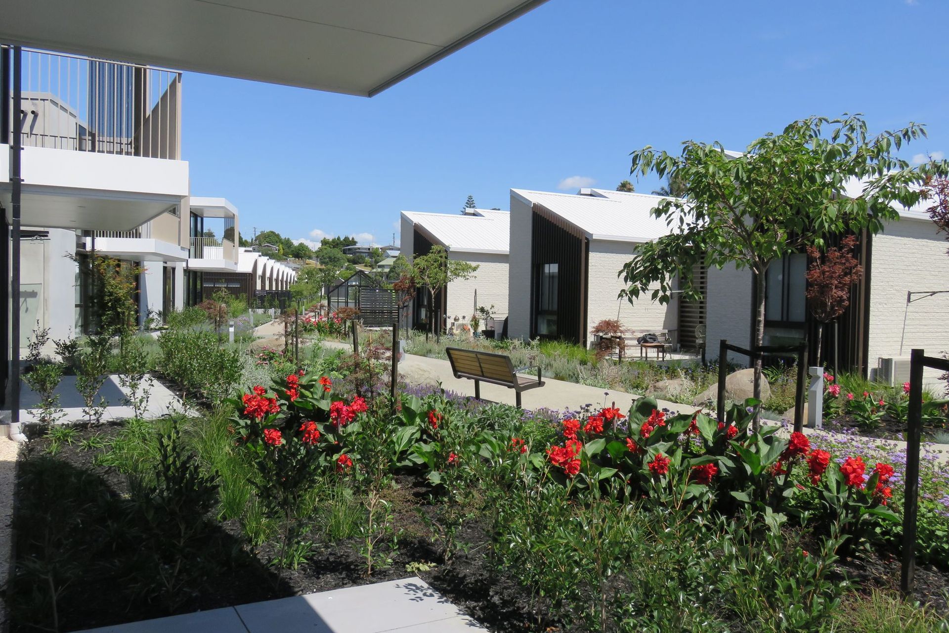 As part of the new model, man-made barriers have been kept to a minimum to encourage the sense of community.  Planting instead has been used to delineate spaces while providing a more pleasant outlook.