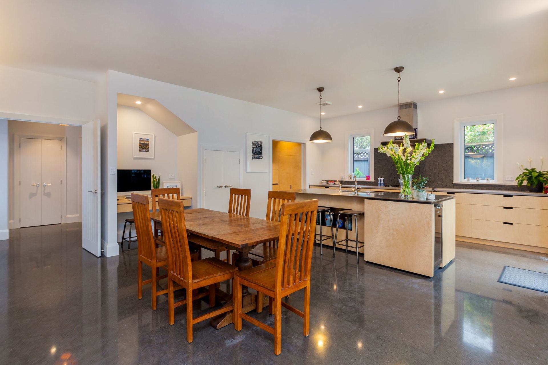 Polished concrete floors in the kitchen and dining.