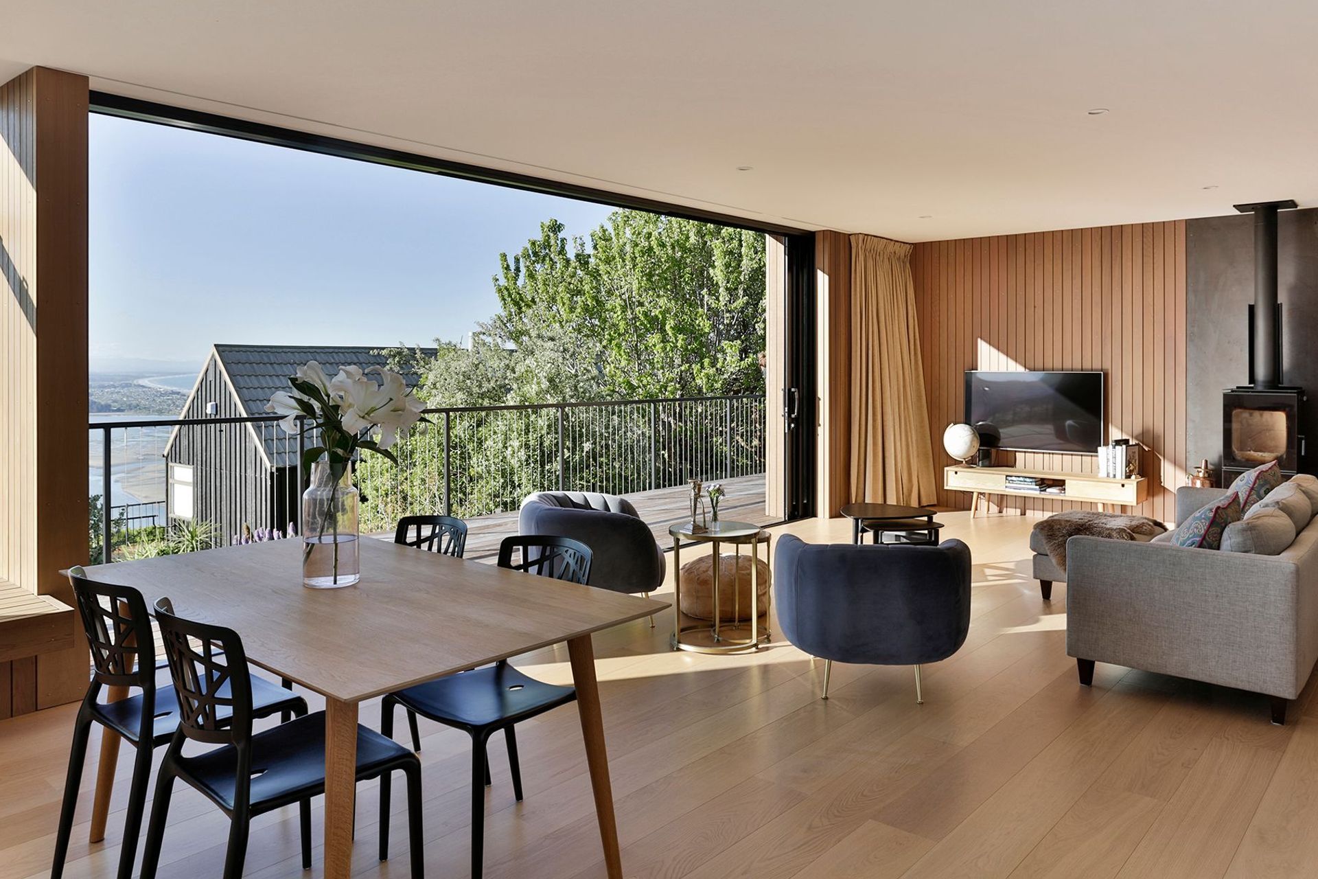 Even though there are neighbours fairly close by,  the home still feels very private due to its arrangement and the established trees on the site.