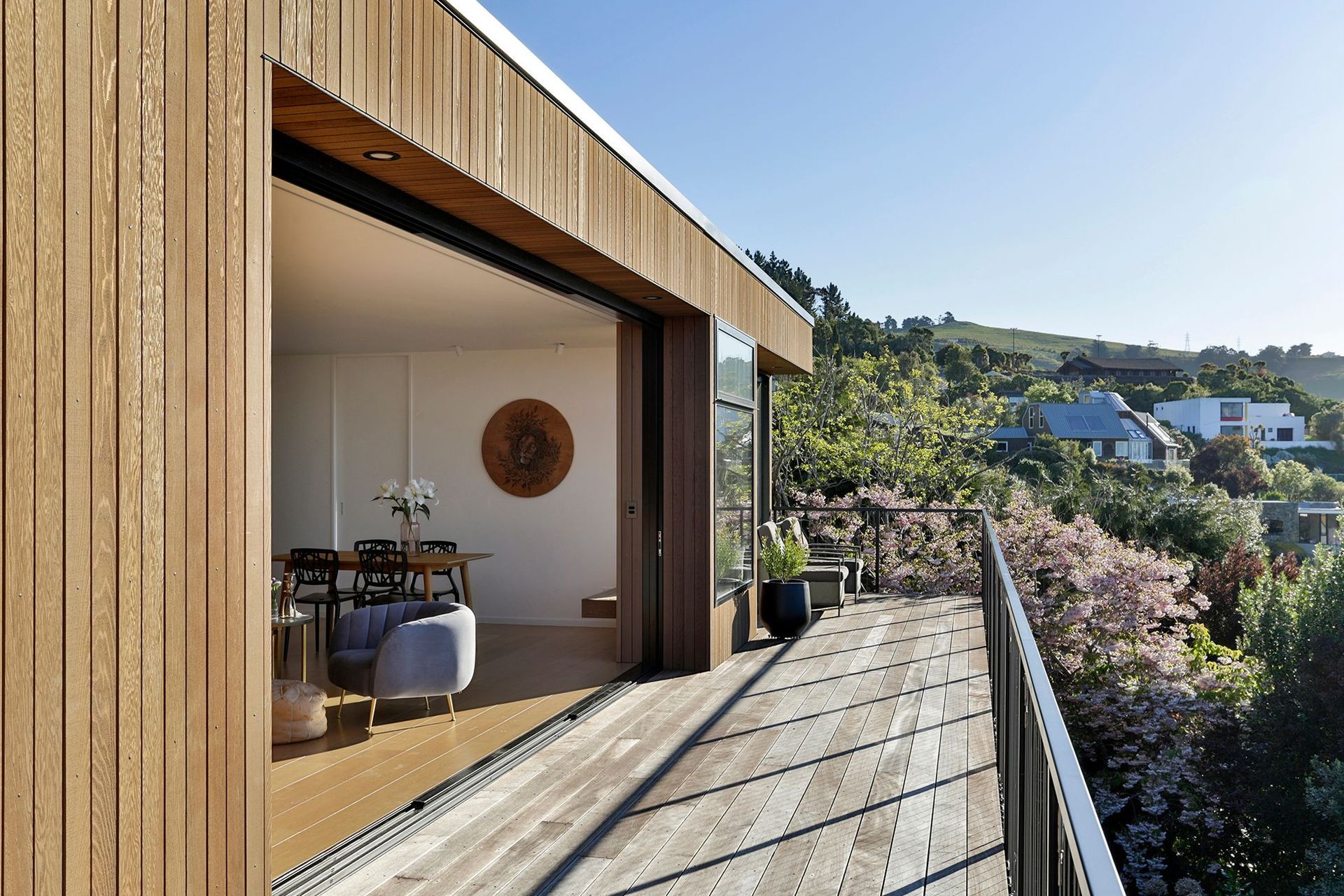 The front deck enjoys elevated views in three directions over the landscape.