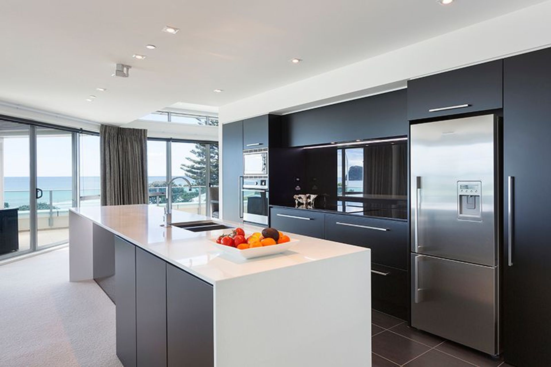 Open plan kitchen, takes advantage of panoramic beach views