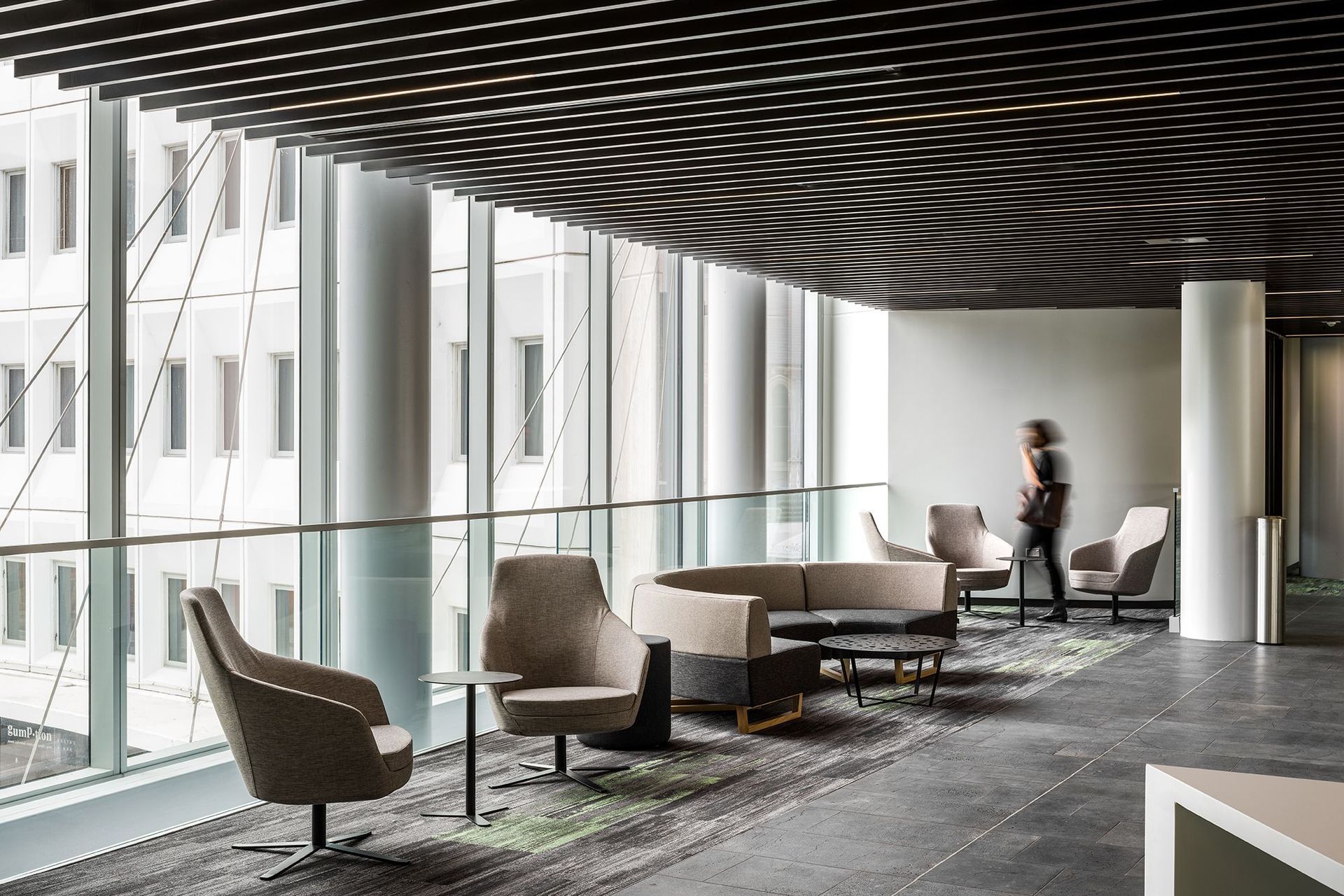 Comfortable seating for informal meetings is a recurring feature throughout the office floors.