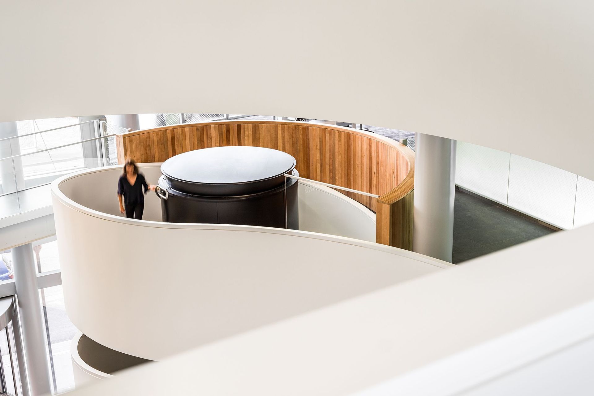 A view of the spiralling staircase from one of the upper level atriums. The  building has a base isolation system in the basement to minimise damage during an earthquake.
