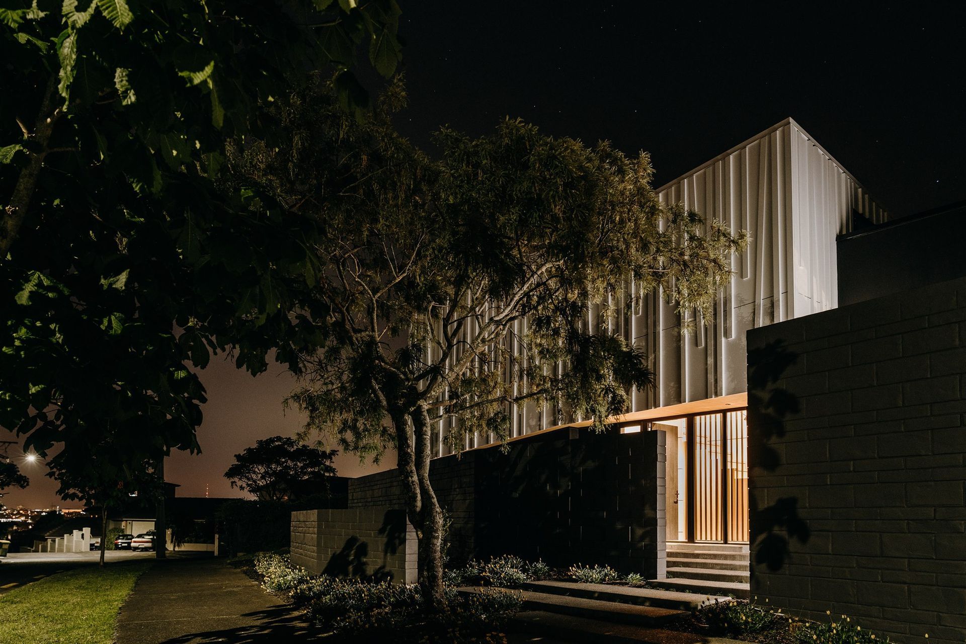 Imposing and private, the streetfront facade offers a level of intrigue giving little of the interiors away. 