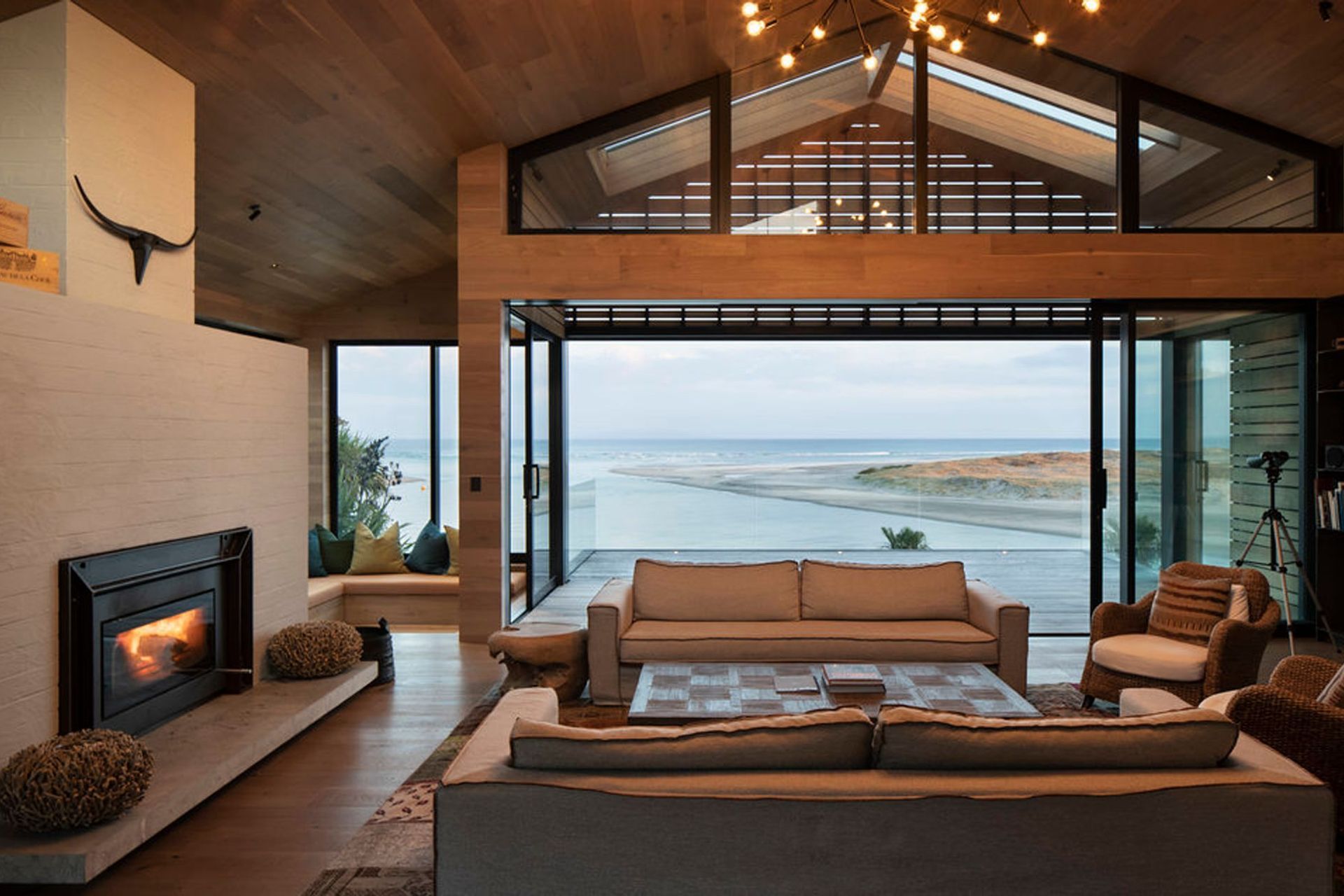 Inside, the pitched ceiling creates a dramatic feature, with the verticality of the space creating a sense of volume