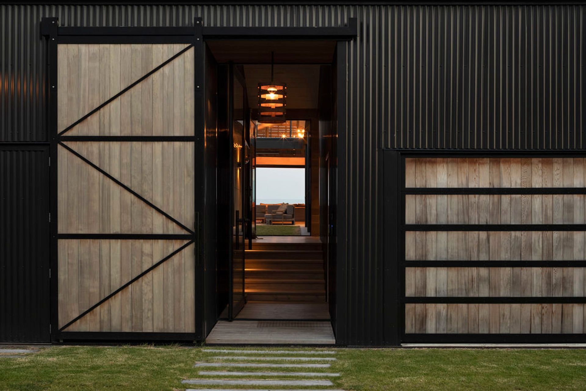 Immediately upon entry, the views through a central courtyard and the main house are captivating.