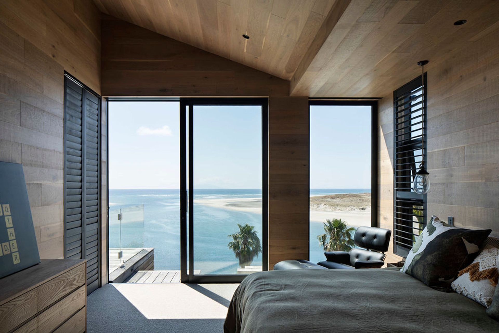 Timber abounds in the interiors, with tones that echo the hues of the natural surrounds.