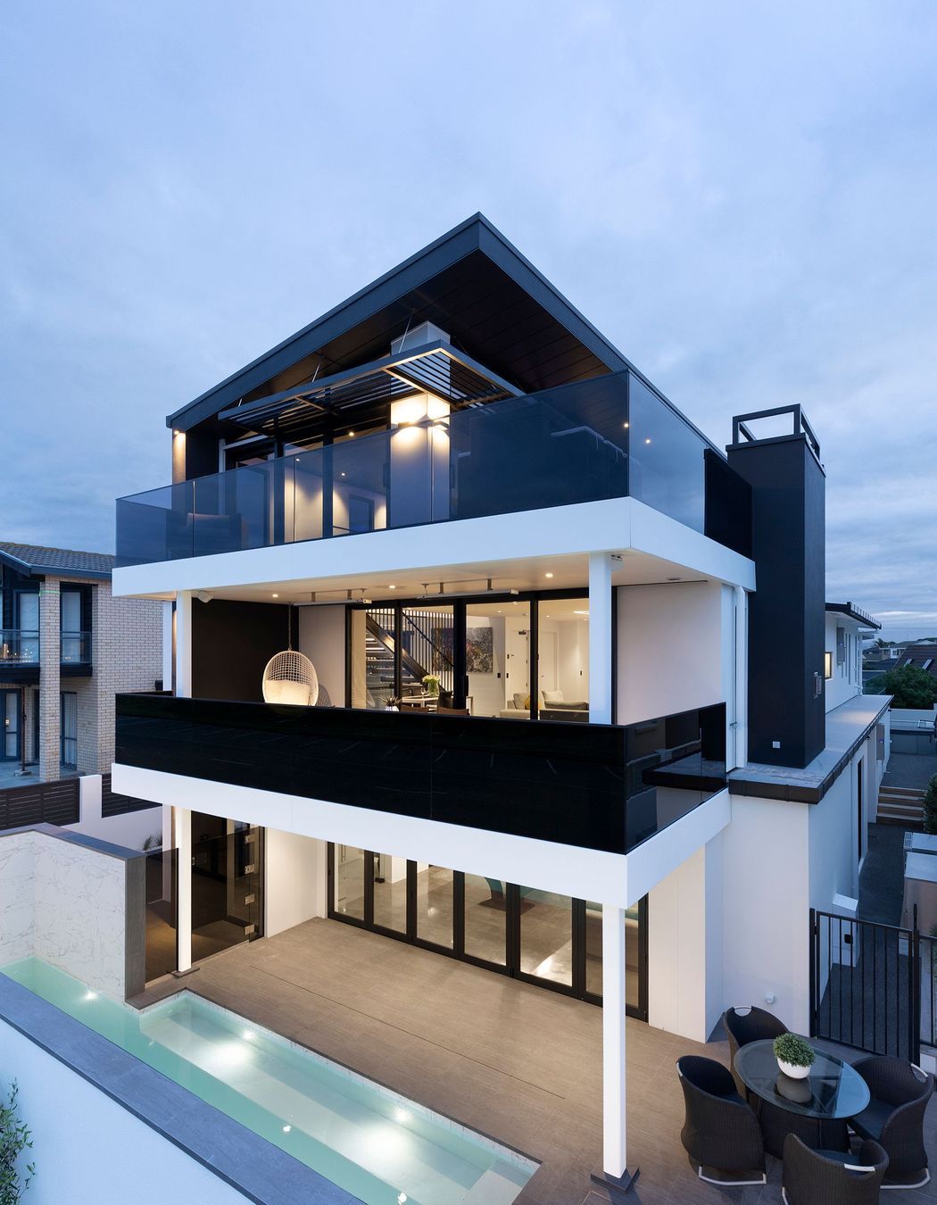 While the home is technically three storeys the ground level is split creating a fourth level. 
