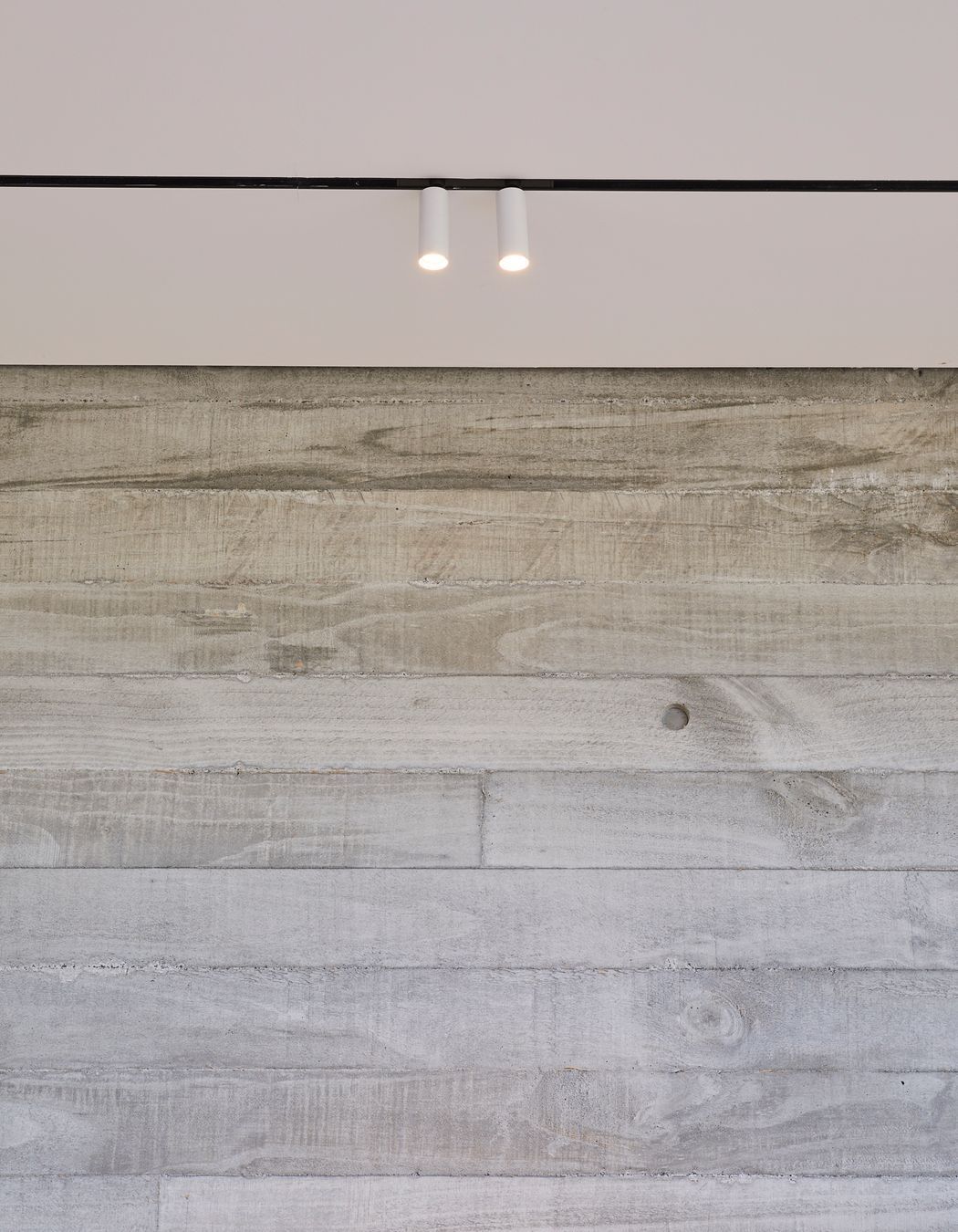 The design intent was for a house that was both aesthetically pleasing and that offered a robustness in materiality, crucial in the coastal setting.