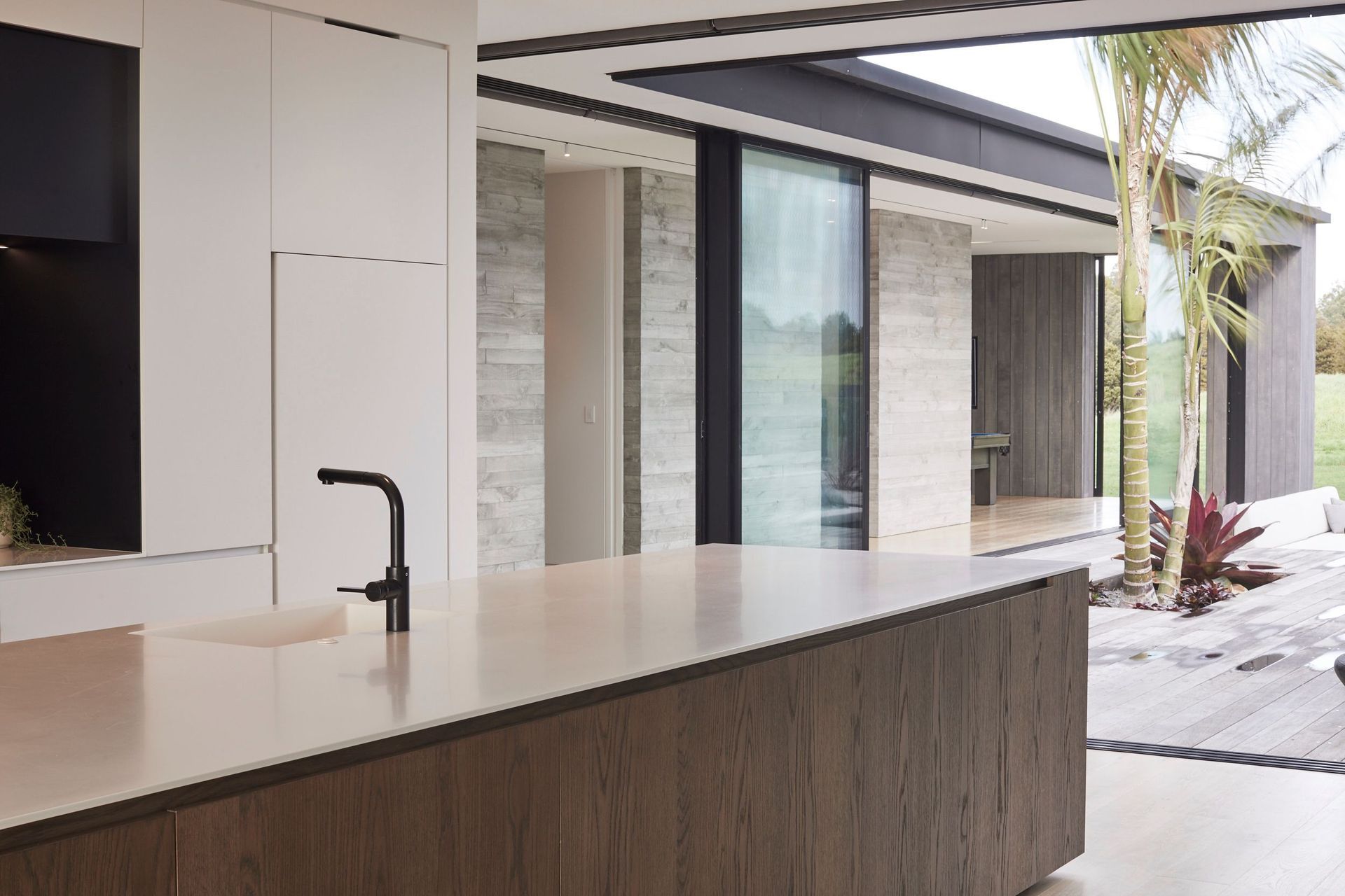 With entertaining a big part of the client's brief, it was important for the kitchen to have easy access to the internal and external entertaining areas.