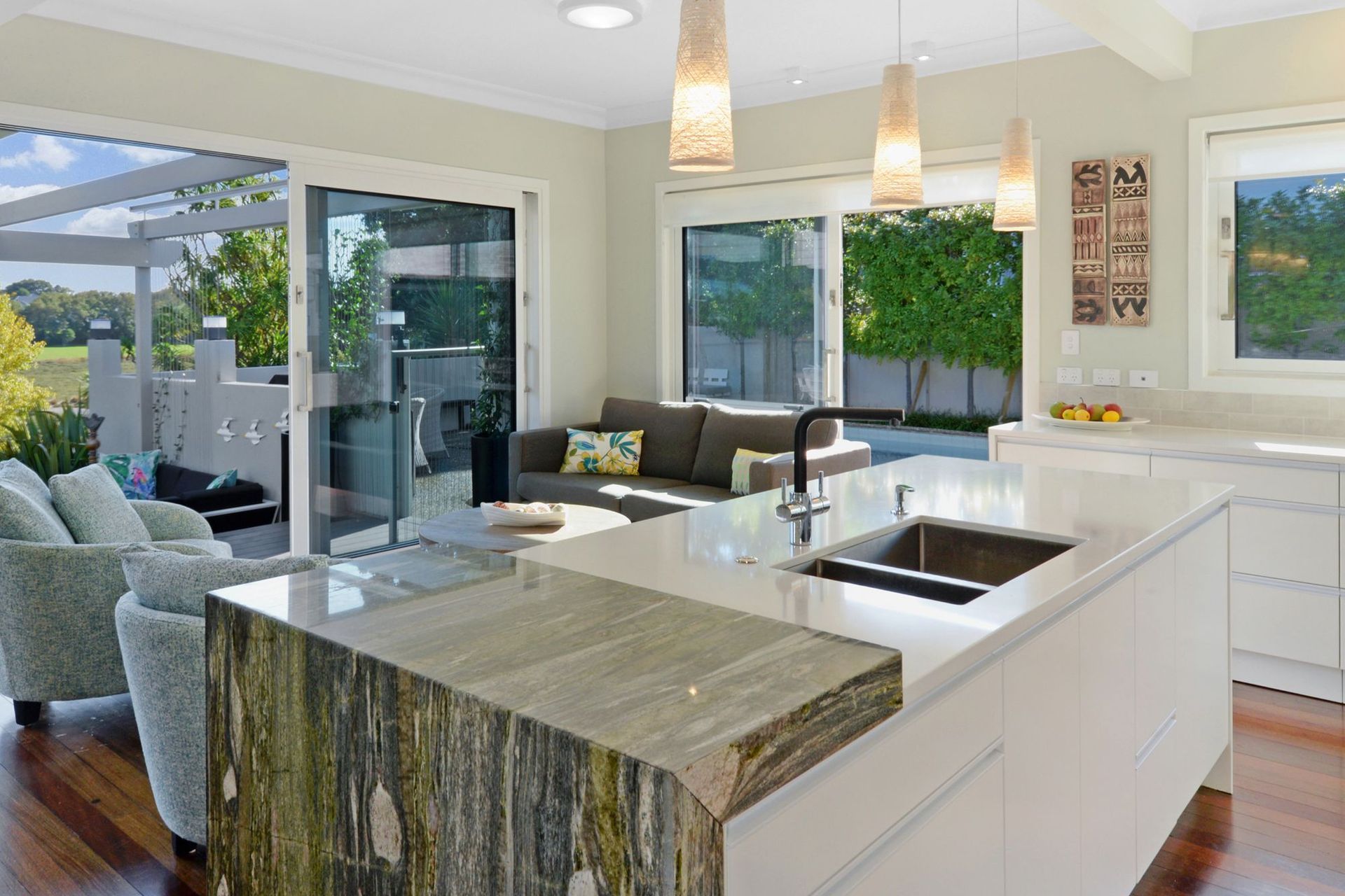 A stunning granite feature benchtop creates a focal point.