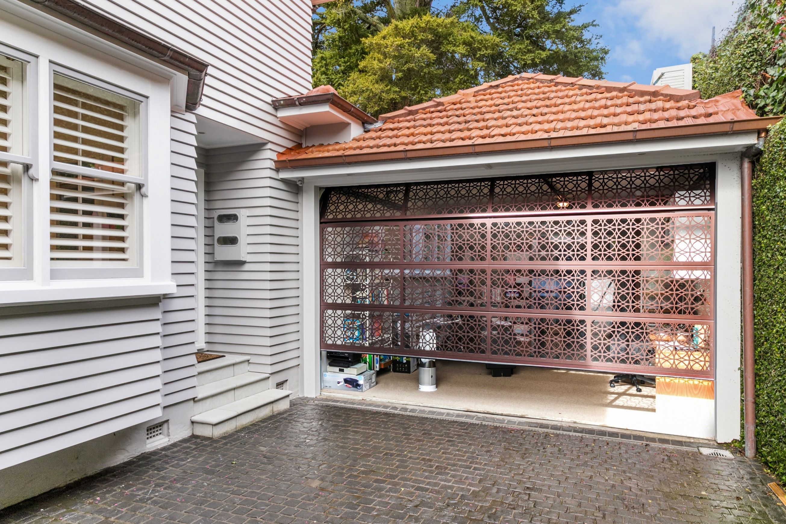 Plexiglass Backed Laser Cut Garage Door