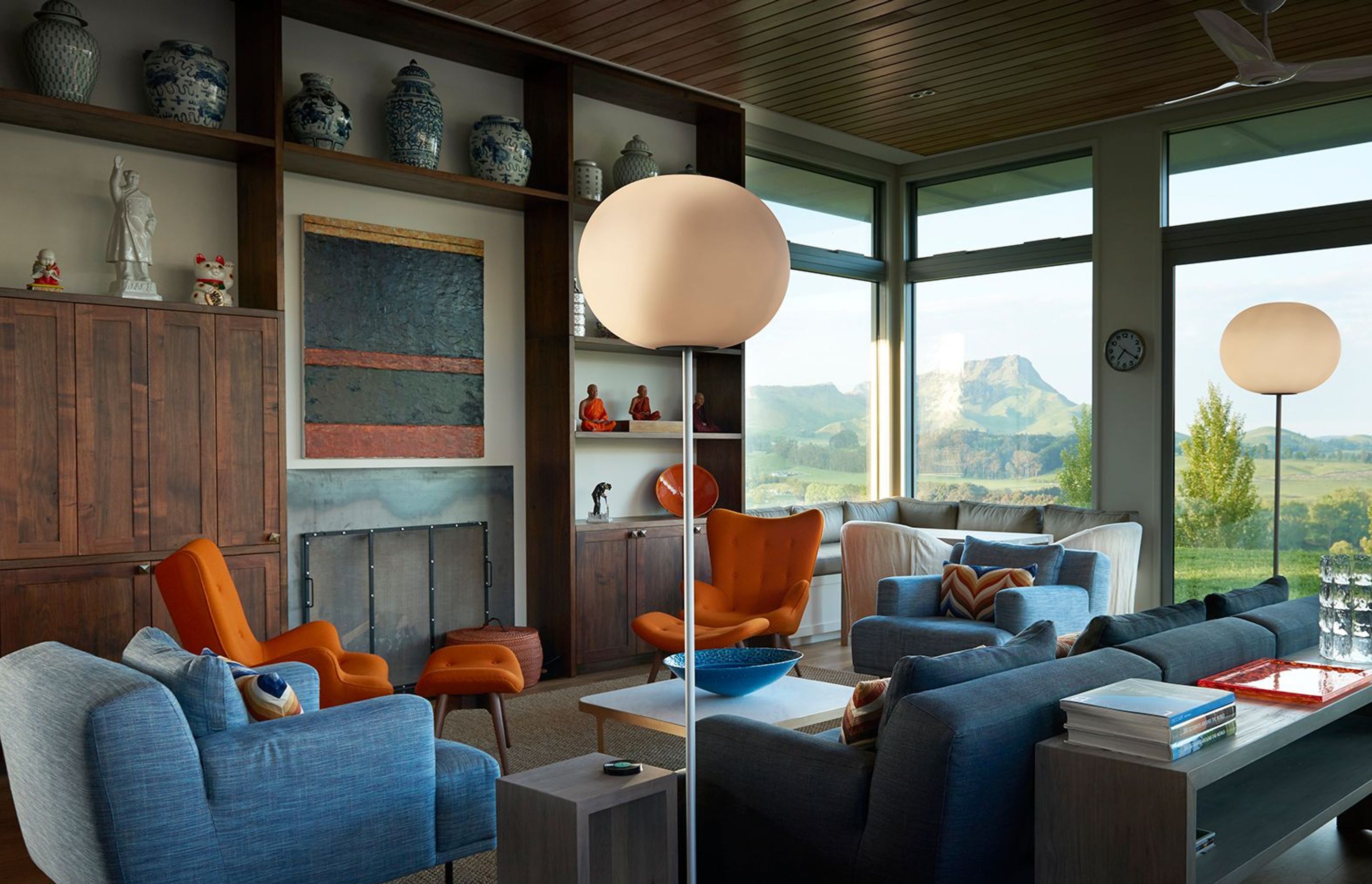 The colourful blue-and-orange lounge area enjoys a direct view out towards the statuesque Te Mata Peak.