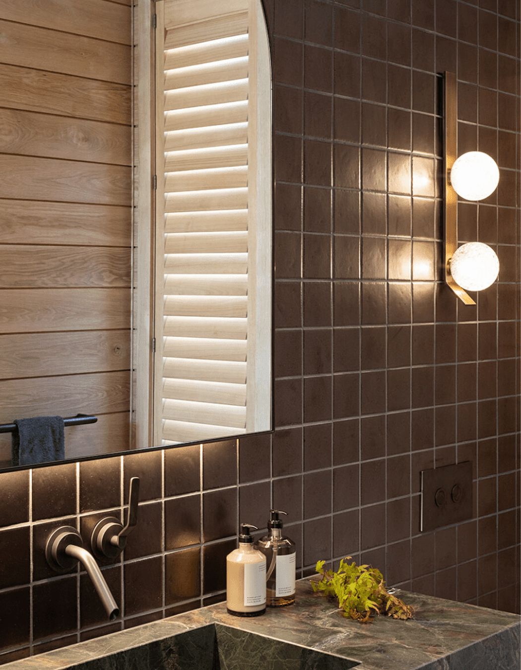 All of the bathrooms used real stone rather than porcelain tiles, to echo the raw and genuine materiality.