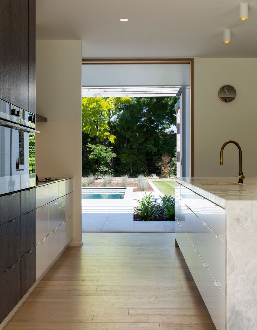 View of the pool area from the kitchen.