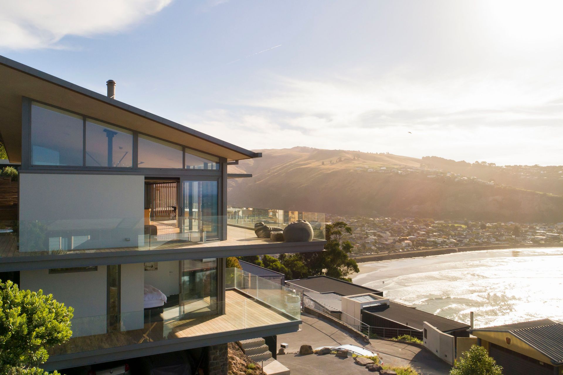 The north elevation. The house was designed across three levels: the basement contains the garage and storage; the ground floor houses the bedrooms and a sauna; and the upper level contains the living areas.