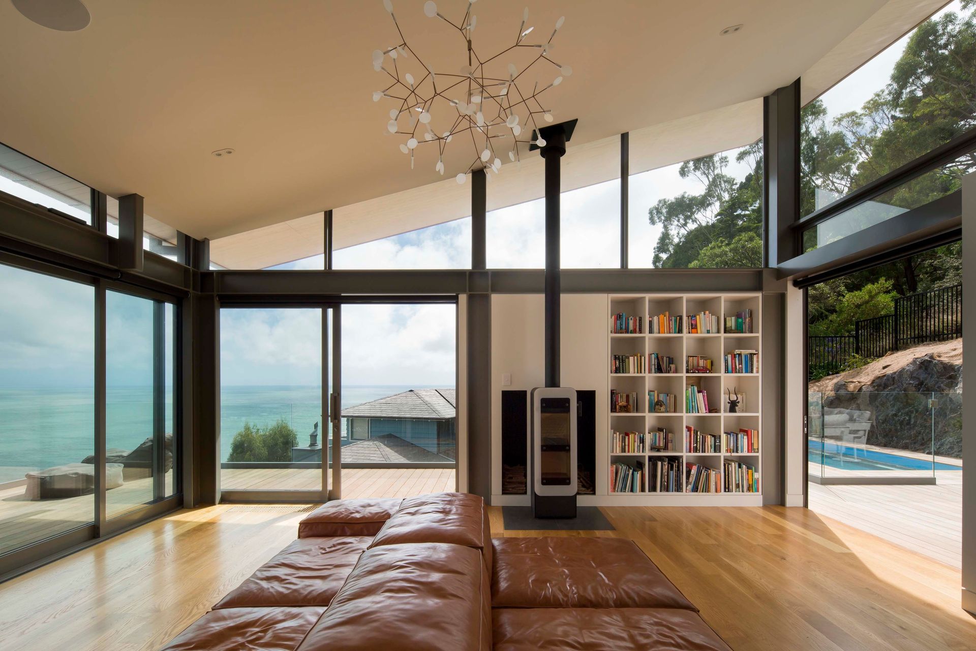 Looking north from the living room, which enjoys a double-aspect and elevated views to the reserve behind the house thanks to the raked ceiling and clerestory windows.