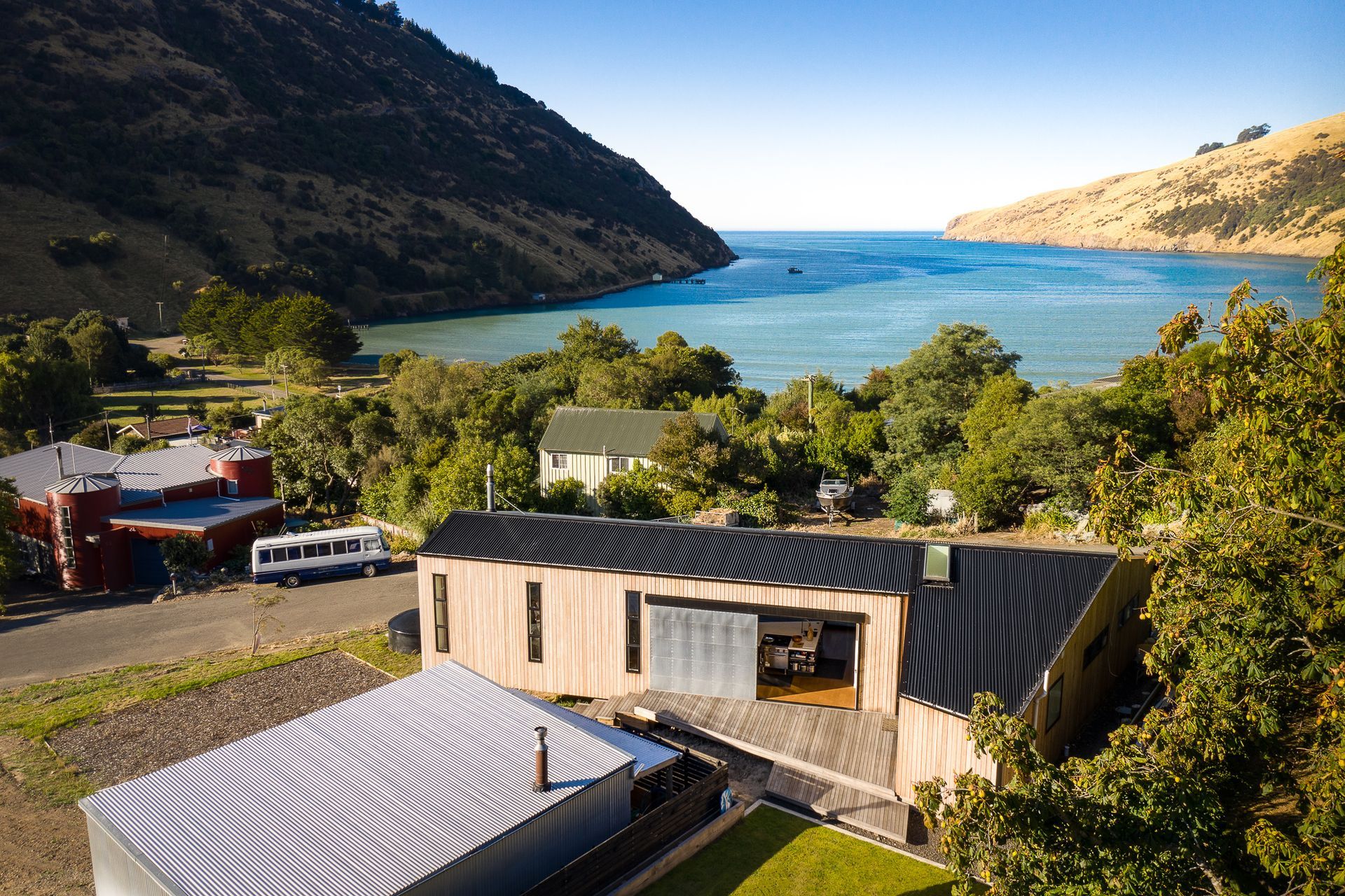 The view was key to the layout of the build as it overs this glorious horseshoe-shaped bay filled with varying shades of turquoise ocean.