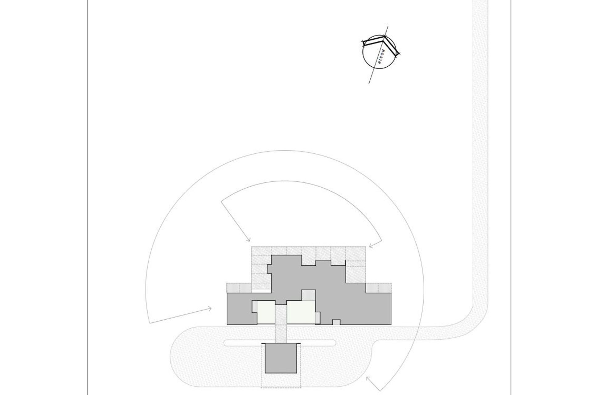 Site plan of Alpine Retreat with roads lying along the north and south boundaries, by Barry Connor Design. Scale 1:300.