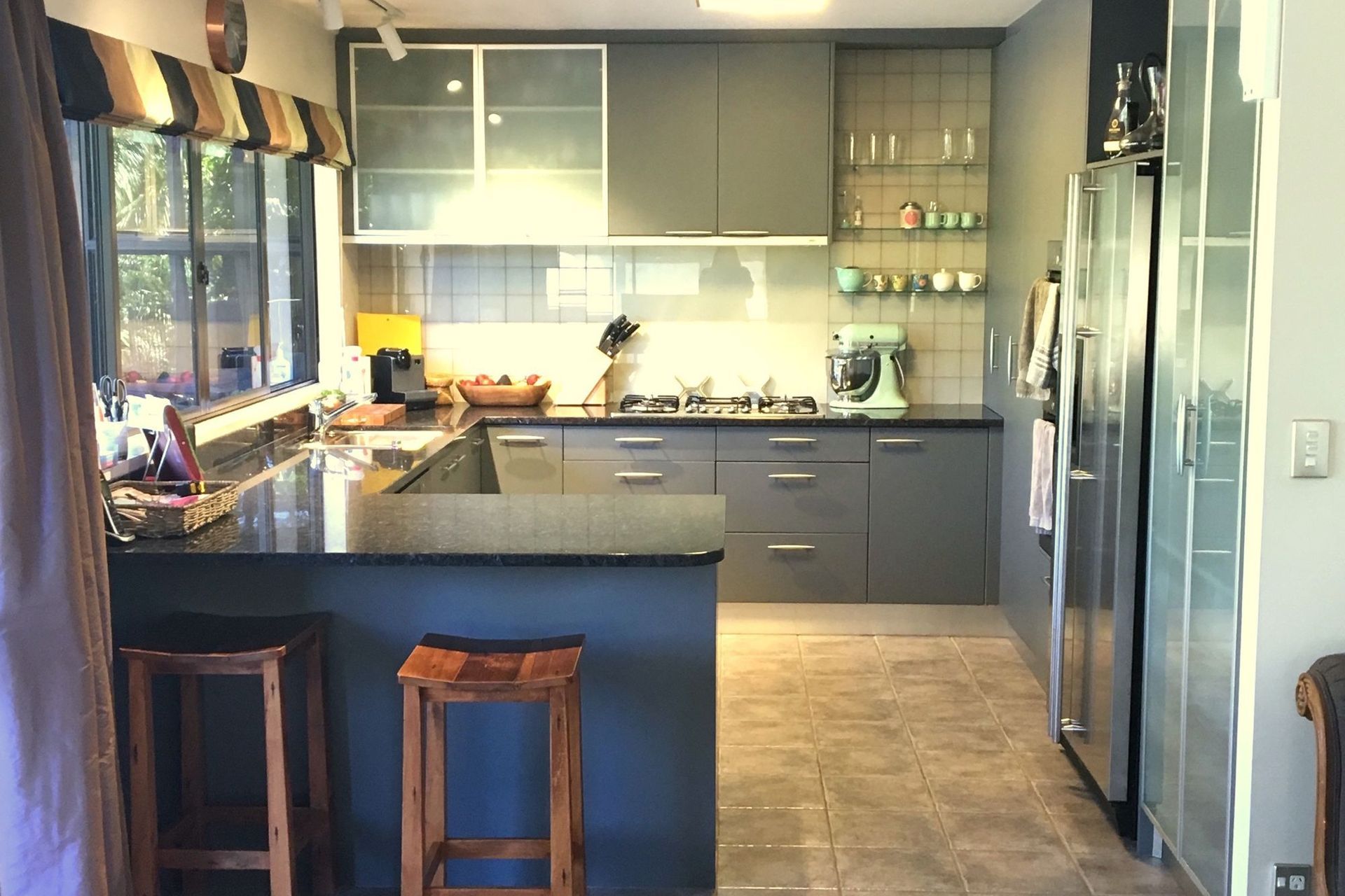 BEFORE - The clients were keen to modernise and lighten the space while improving storage organisation.