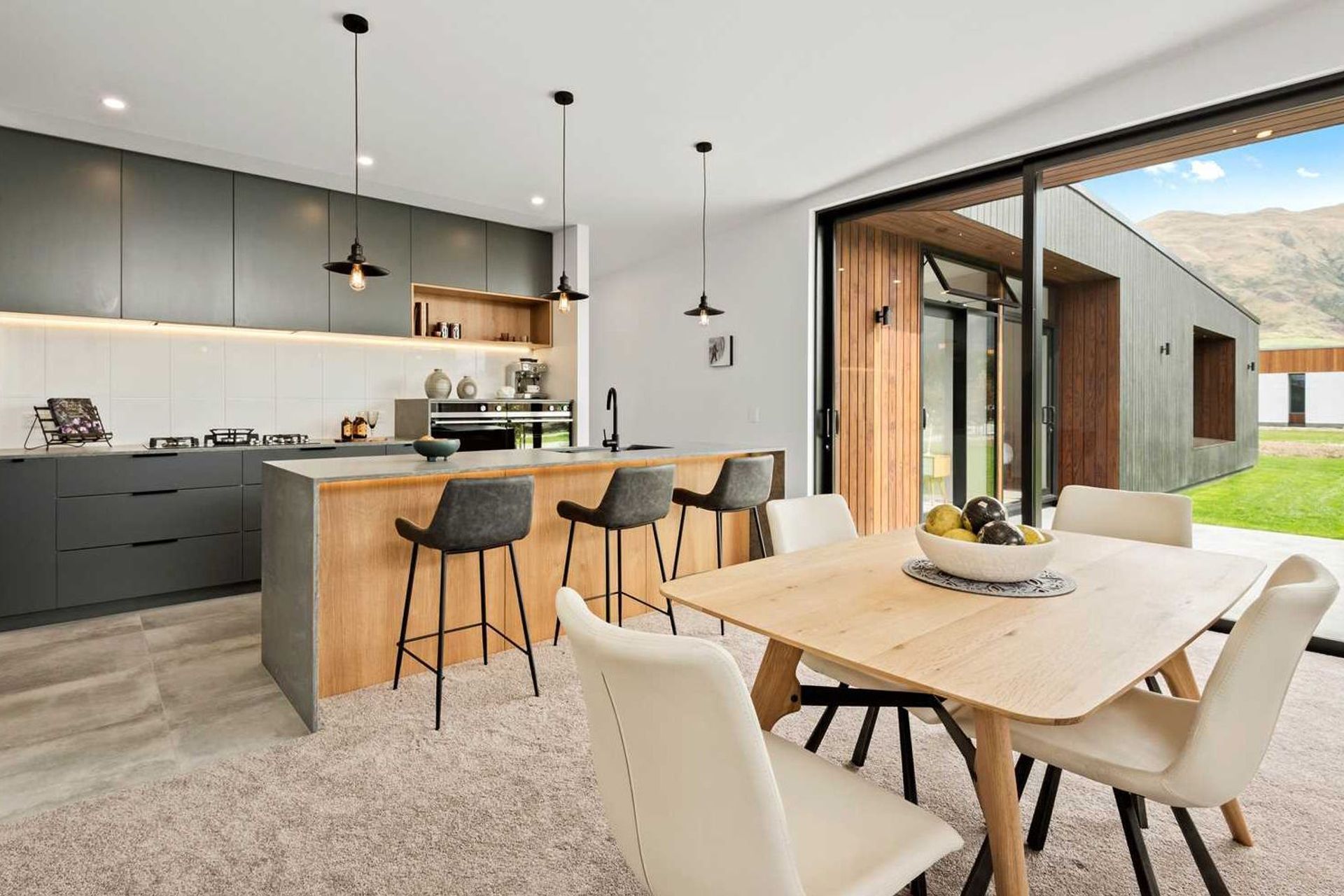 A differently configured kitchen and dining area in one of the other homes.