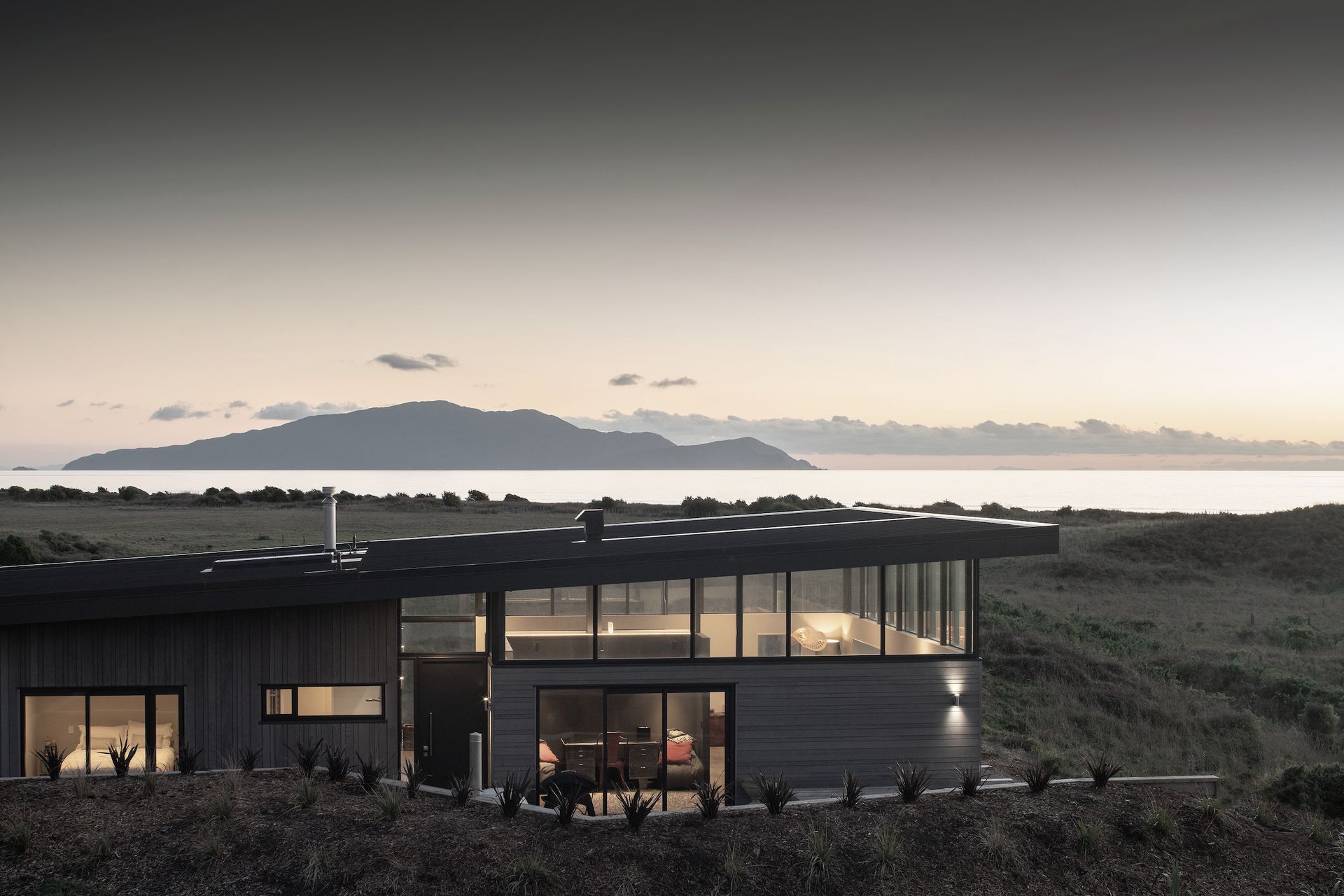 The view across the dunes and water towards Kapiti Island was a significant factor in the siting of the house.