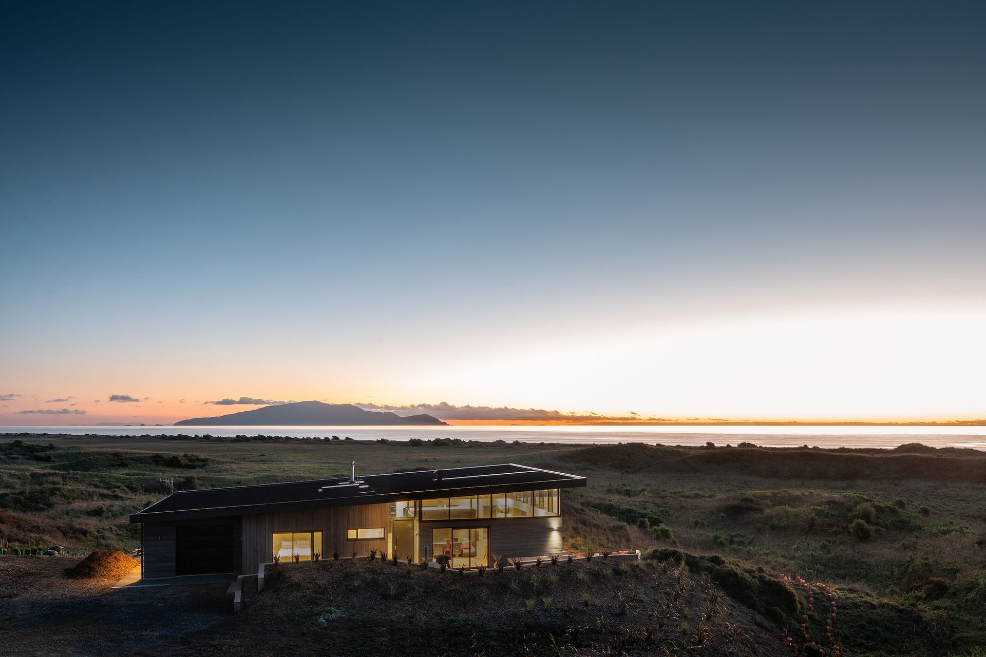 Situated just 300m from the water's edge at Te Horo Beach, this house has been designed so that it can transition from being a holiday house to a full-time residence.