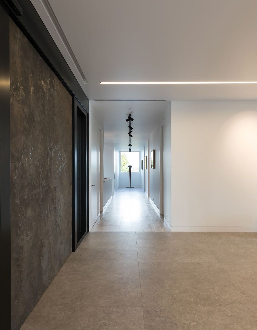 The 2.2m x 3m aluminium front door is embossed with a stingray skin pattern.